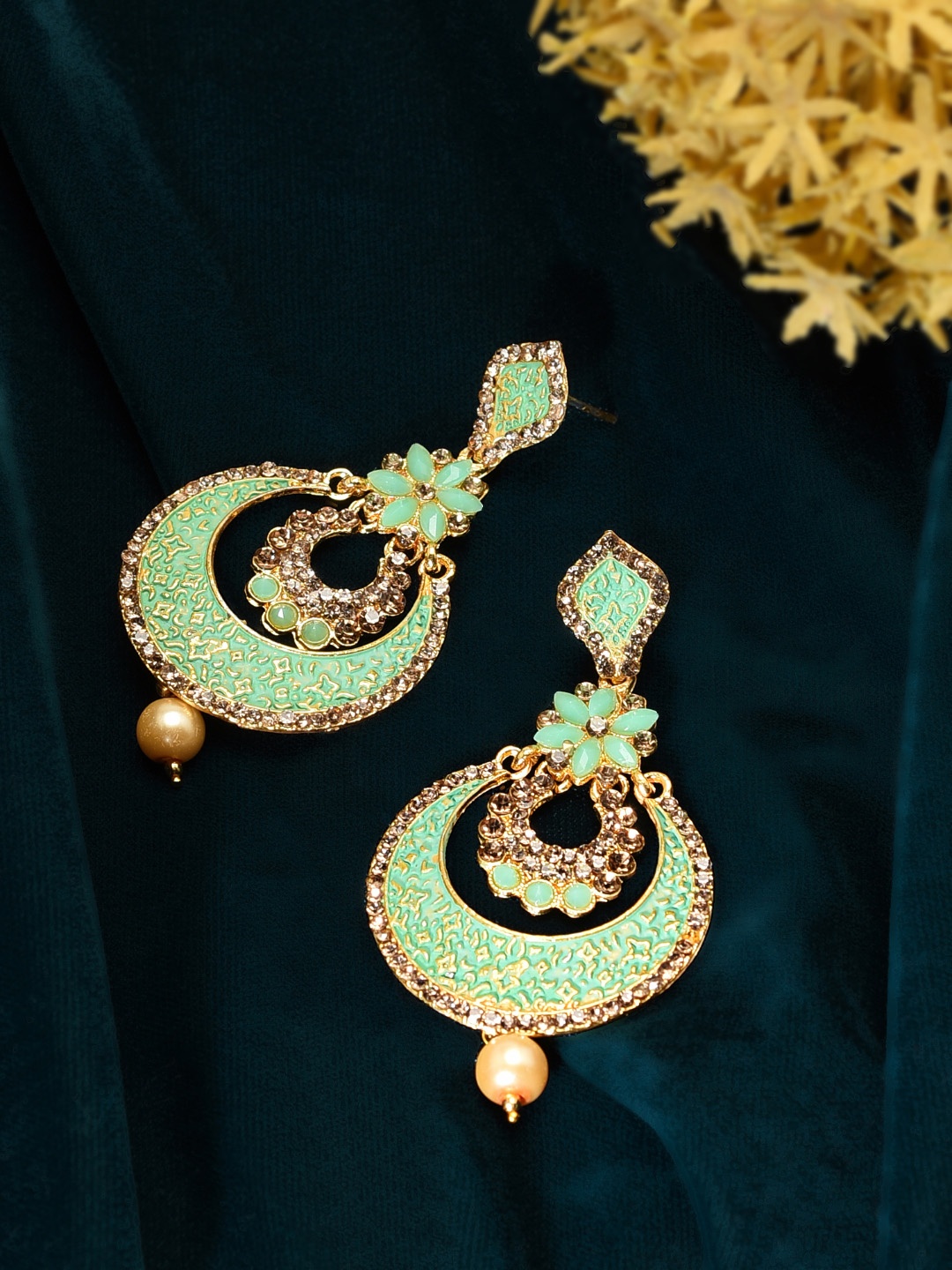 

Zaveri Pearls Blue Gold-Plated Crescent Shaped Chandbalis