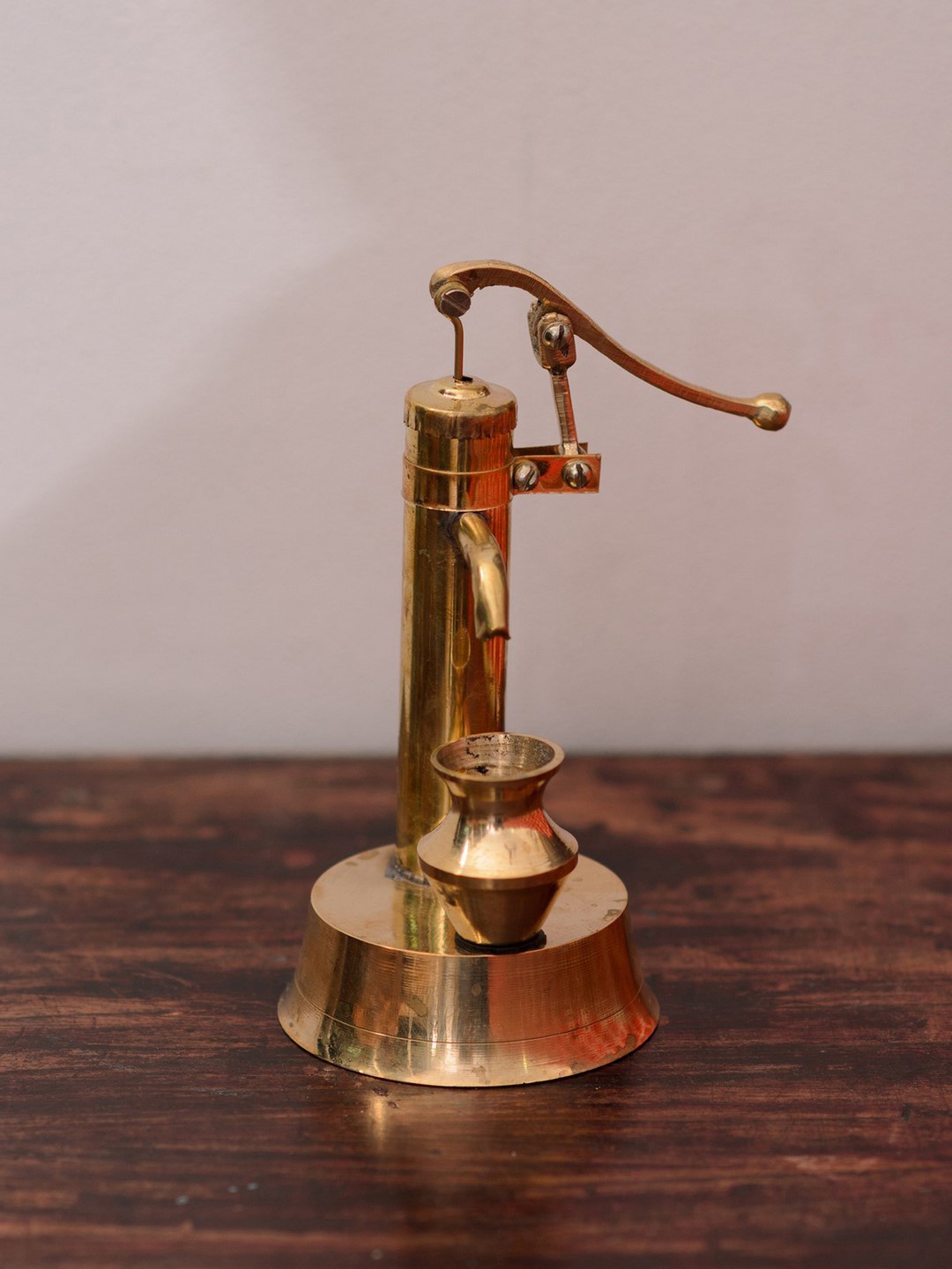 

eCraftIndia Gold-Toned Brass Antique Handcrafted Hand Pump Showpiece