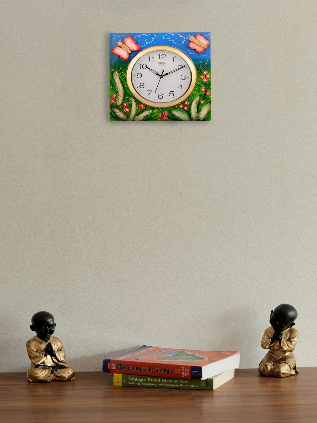 

eCraftIndia White Dial Green & Blue Printed 30.48cmx1.27cm Wall Clock