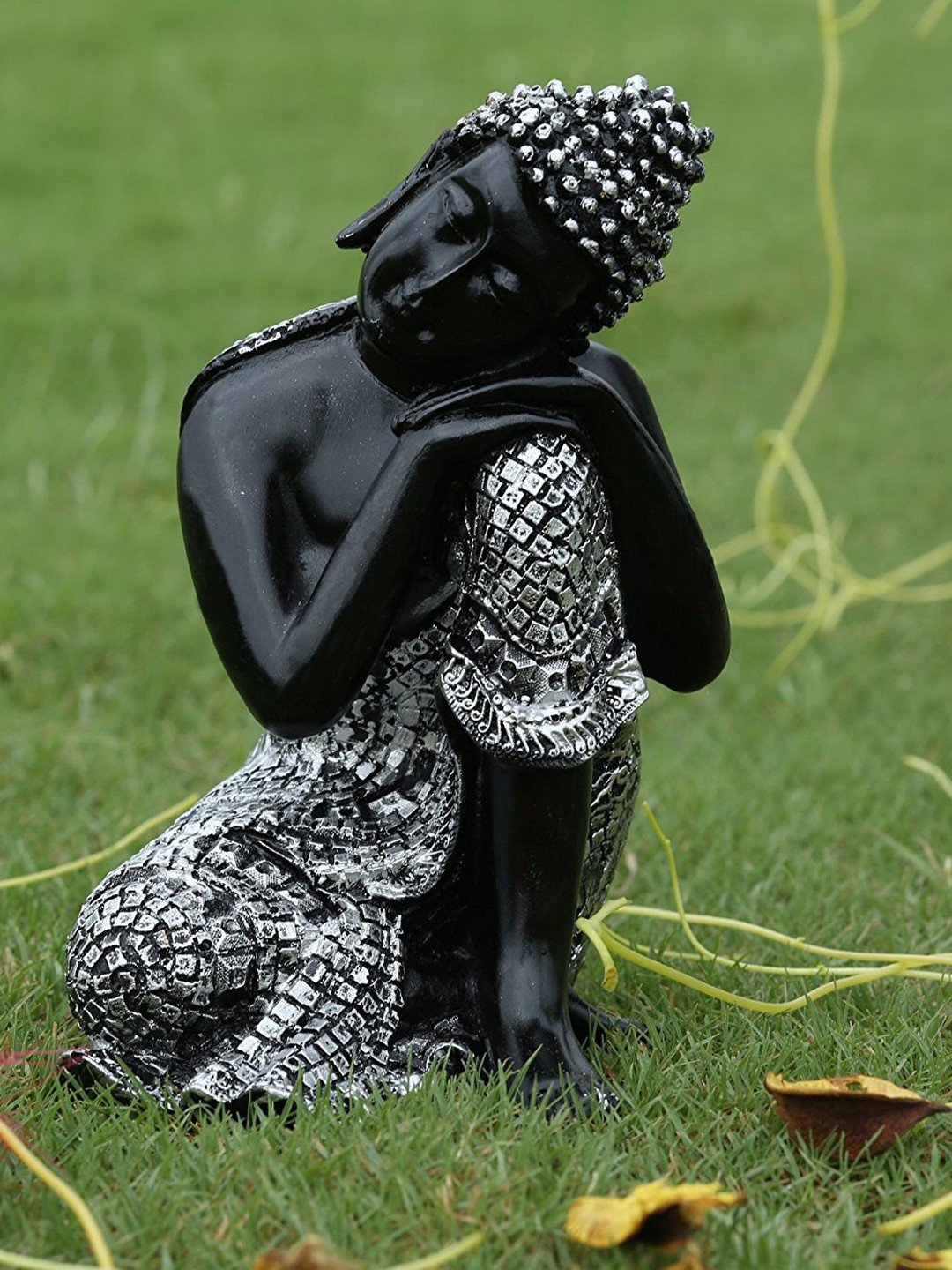

eCraftIndia Silver-Toned & Black Resting Buddha on Knee Idol