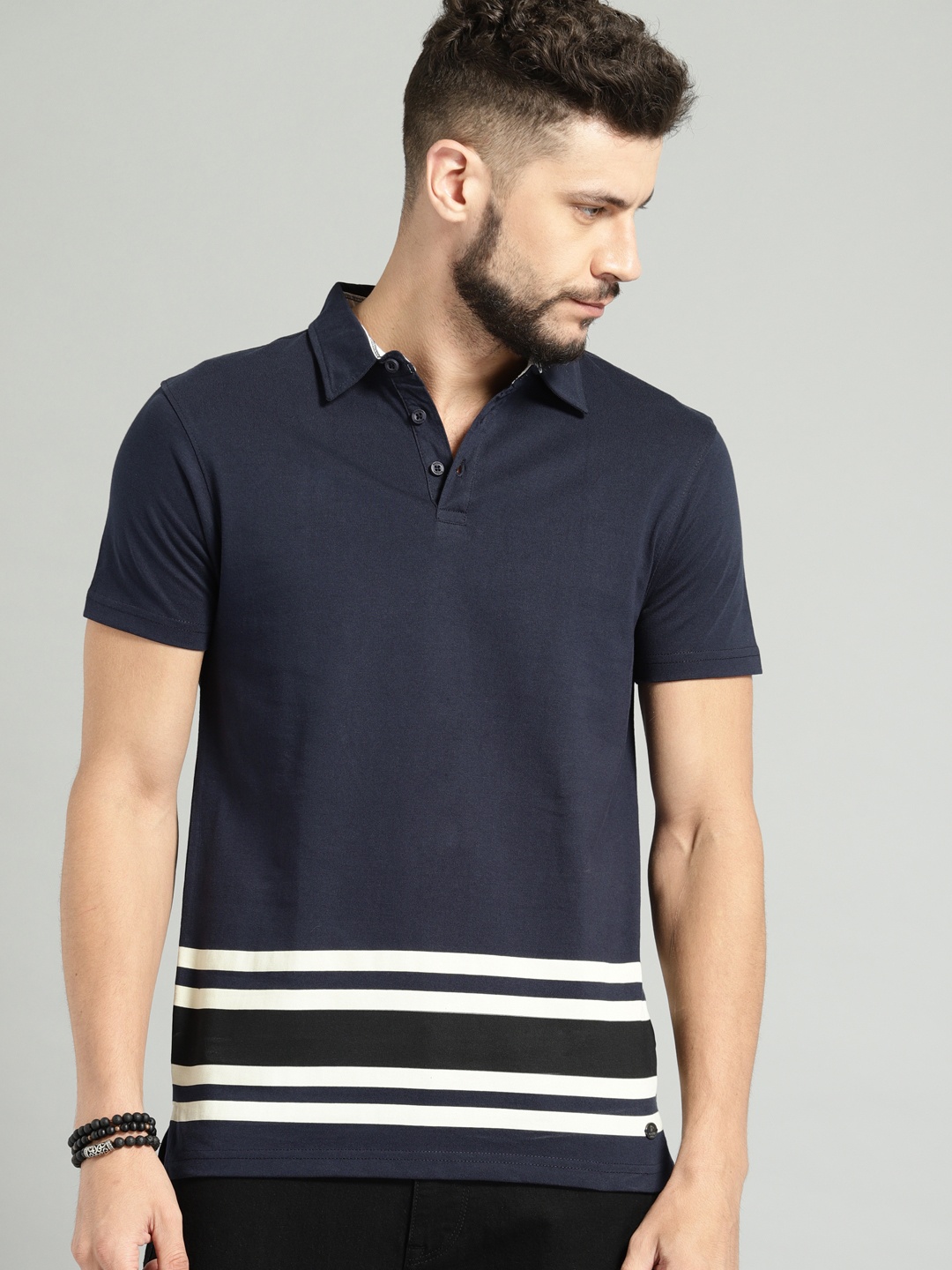 

Roadster Men Navy Blue Striped Polo Collar Pure Cotton T-shirt