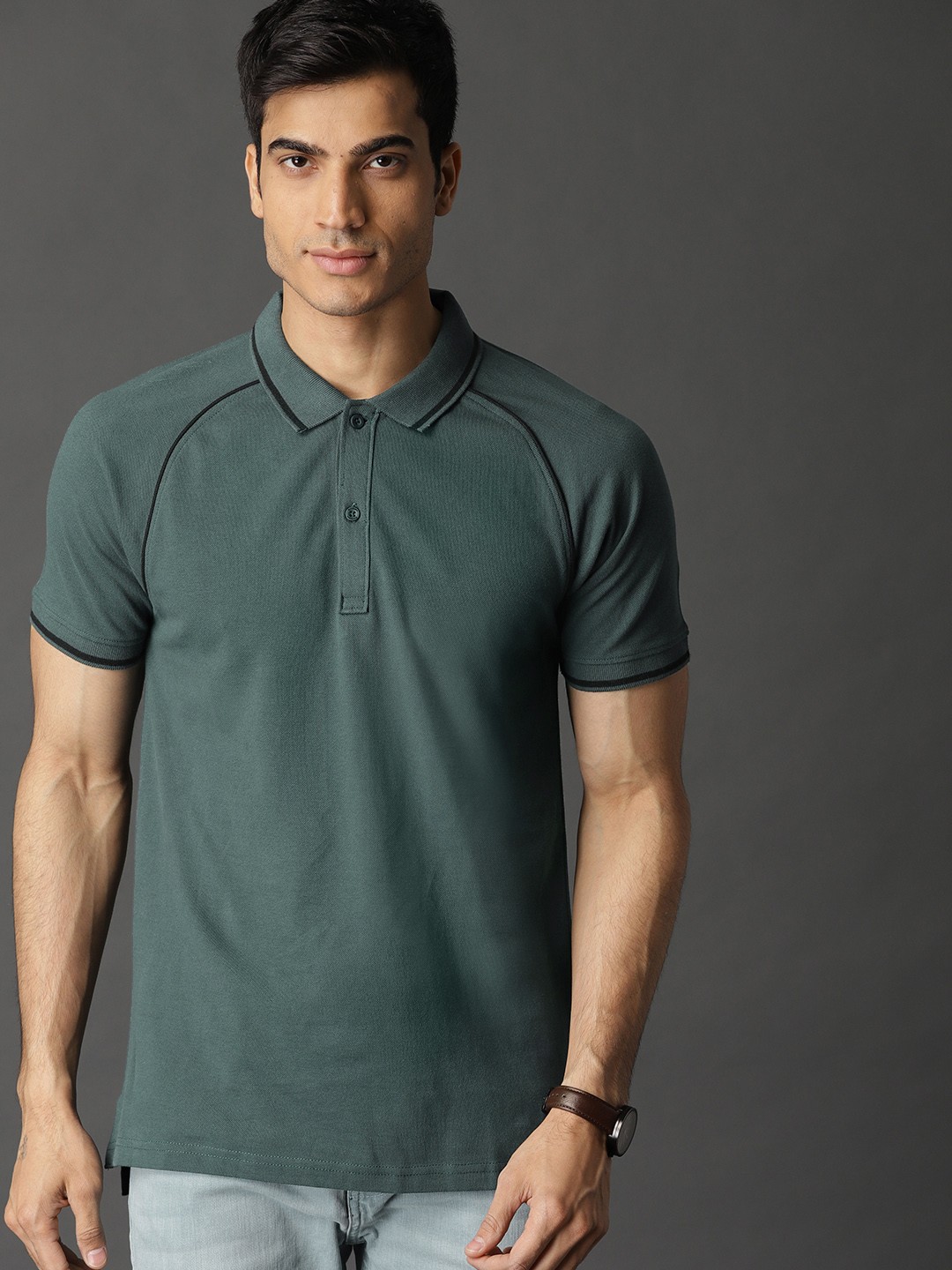 

Roadster Men Green Solid Polo Collar Pure Cotton T-shirt