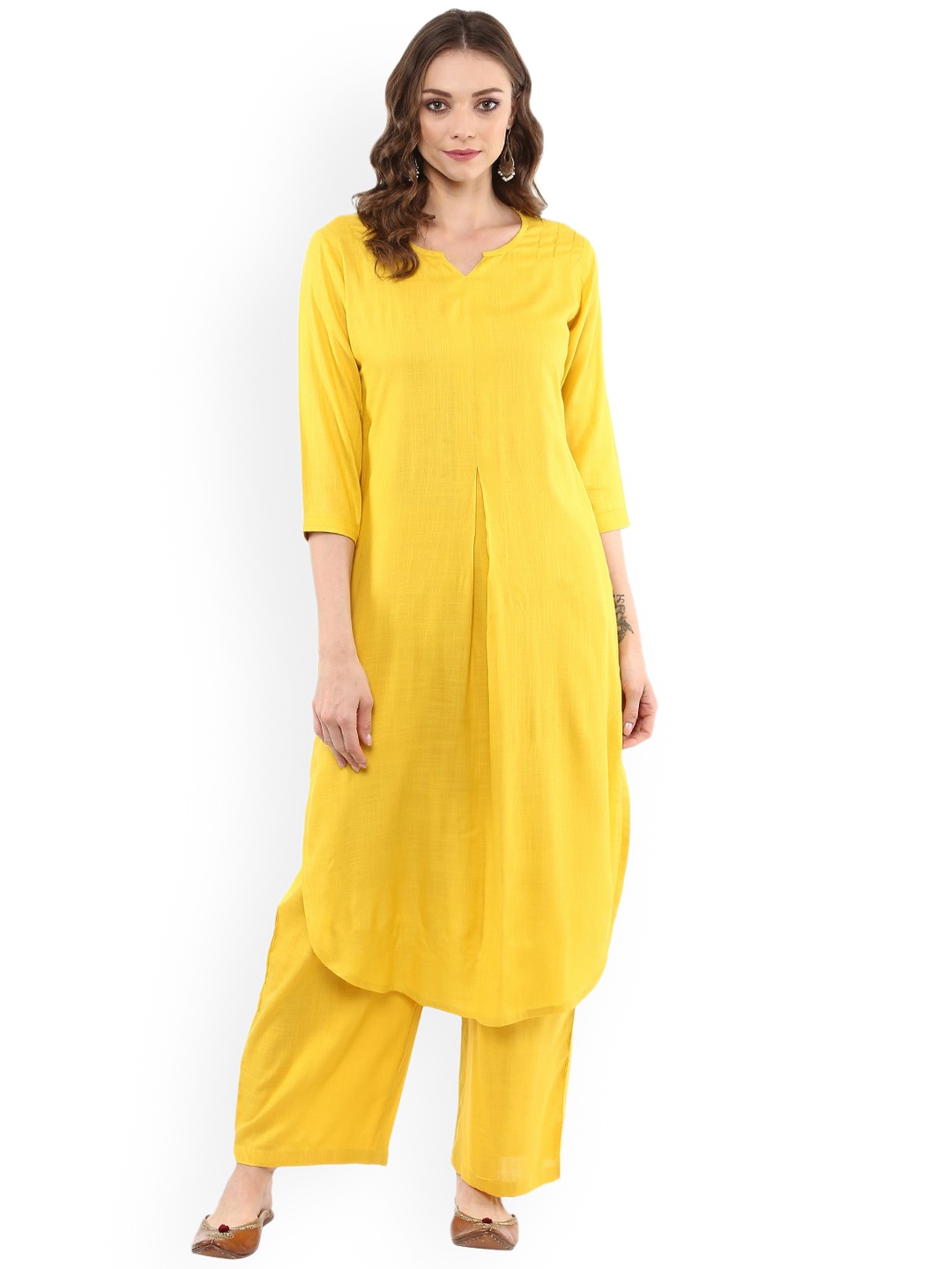 

Idalia Women Yellow Solid Kurta with Palazzos