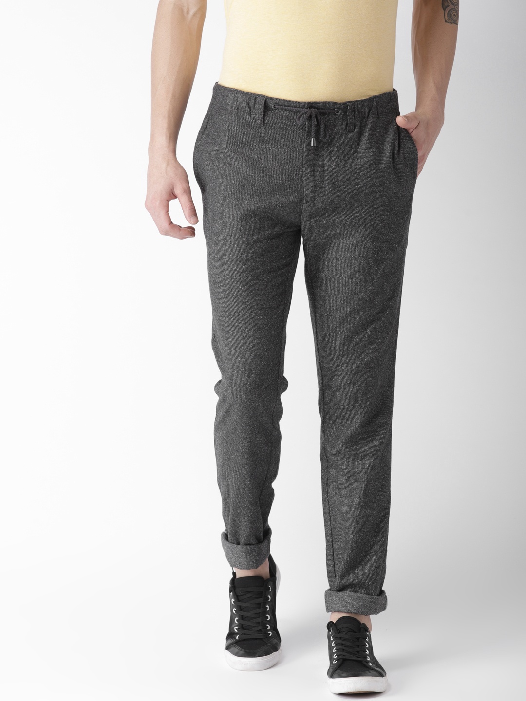 

Tommy Hilfiger Men Grey Self Design Regular Trousers