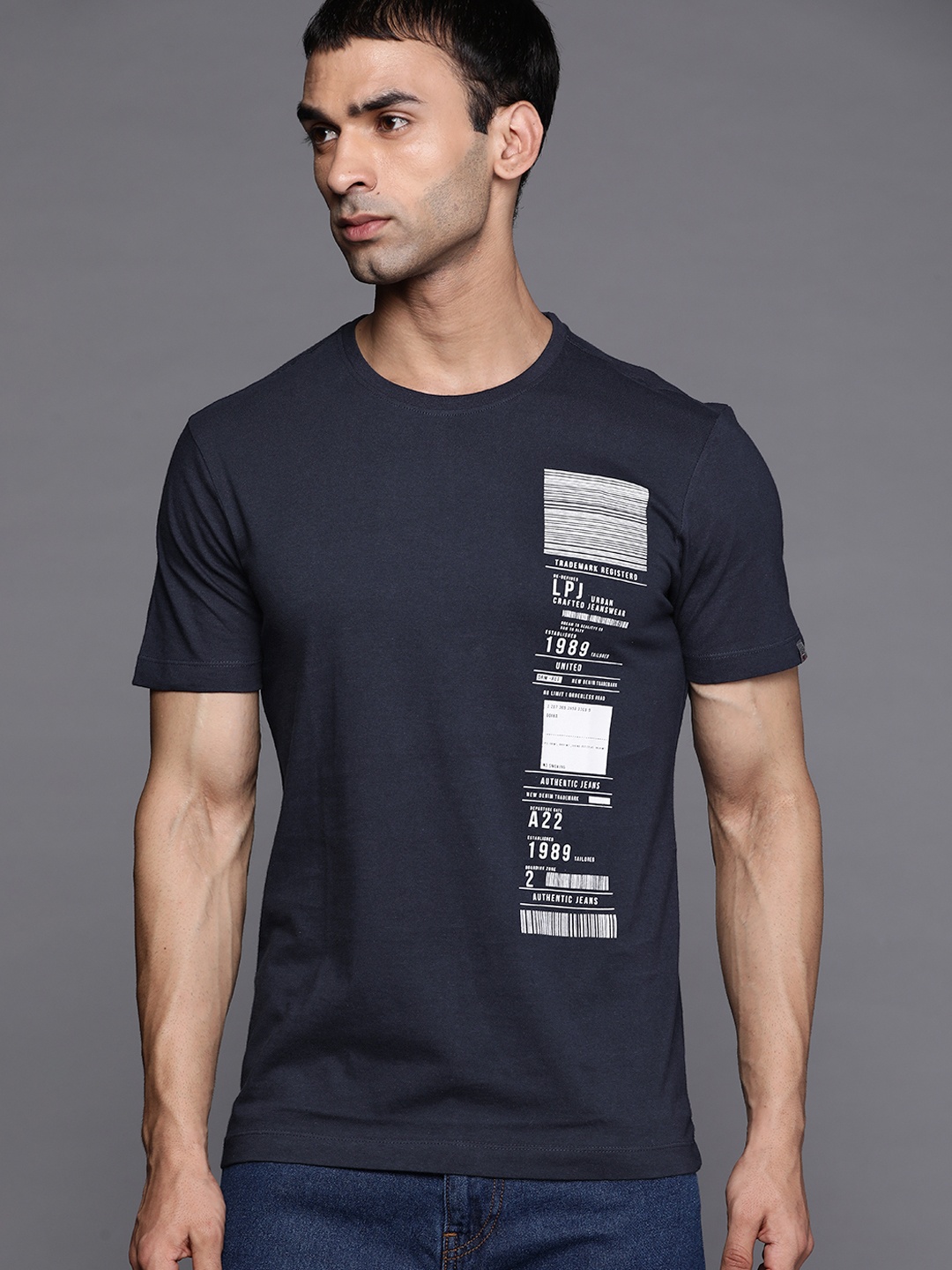 

Louis Philippe Jeans Men Navy Blue & White Pure Cotton Printed T-shirt