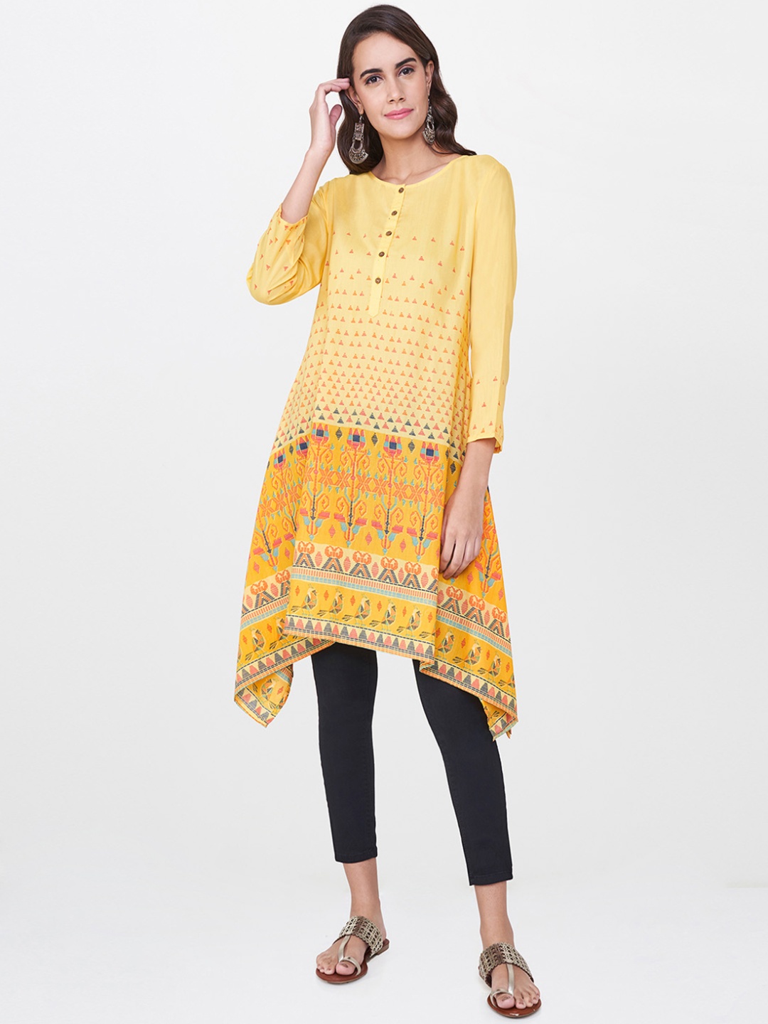 

Global Desi Women Yellow Printed Asymmetric A-Line Kurta