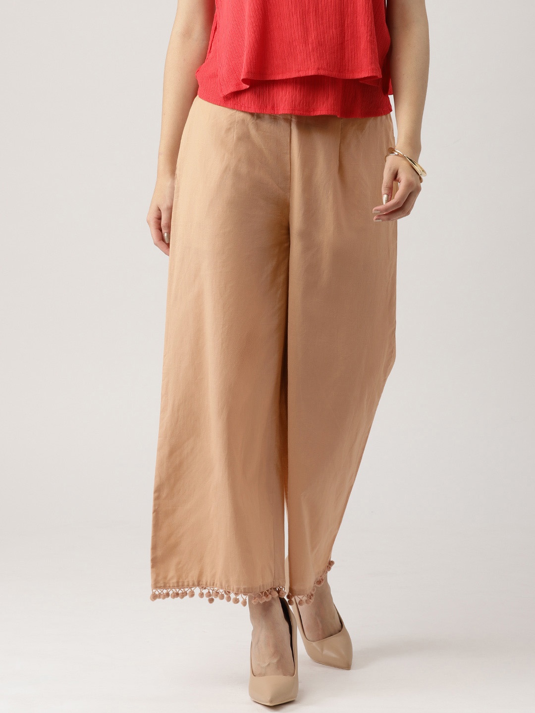 

Libas Women Beige Solid Wide Leg Palazzos