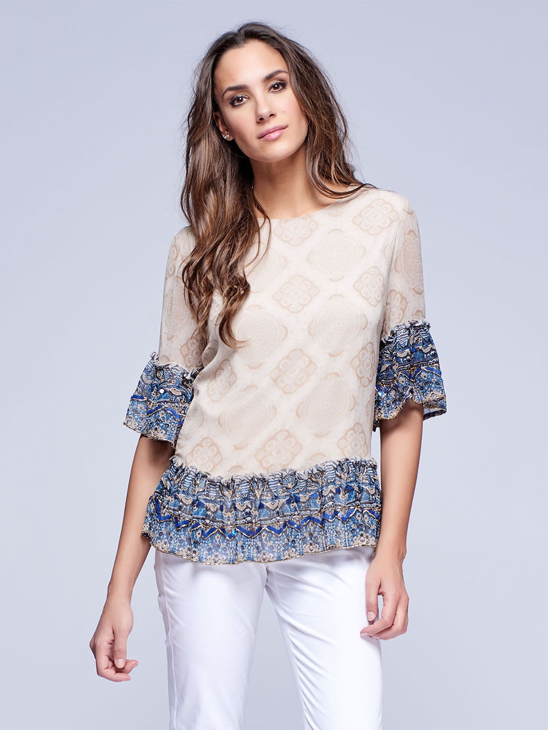 

NIZA Women Beige Printed Peplum Top