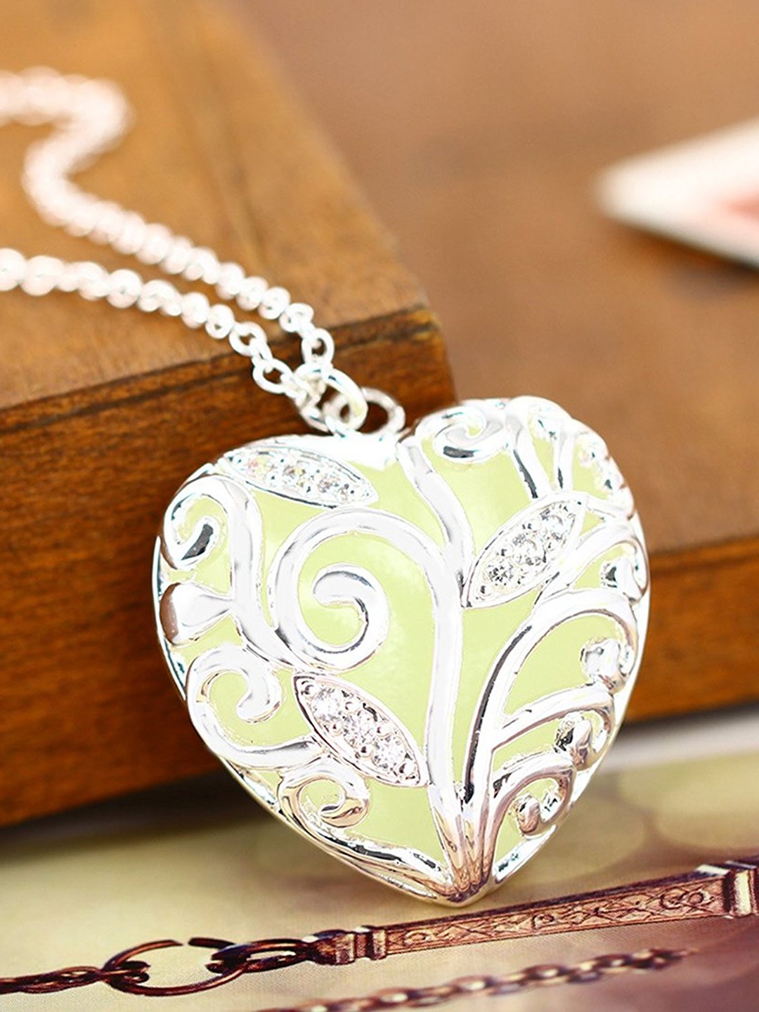 

Peora Sliver-Tone Heart Shaped Glow in the Dark Pendant with Chain, Silver