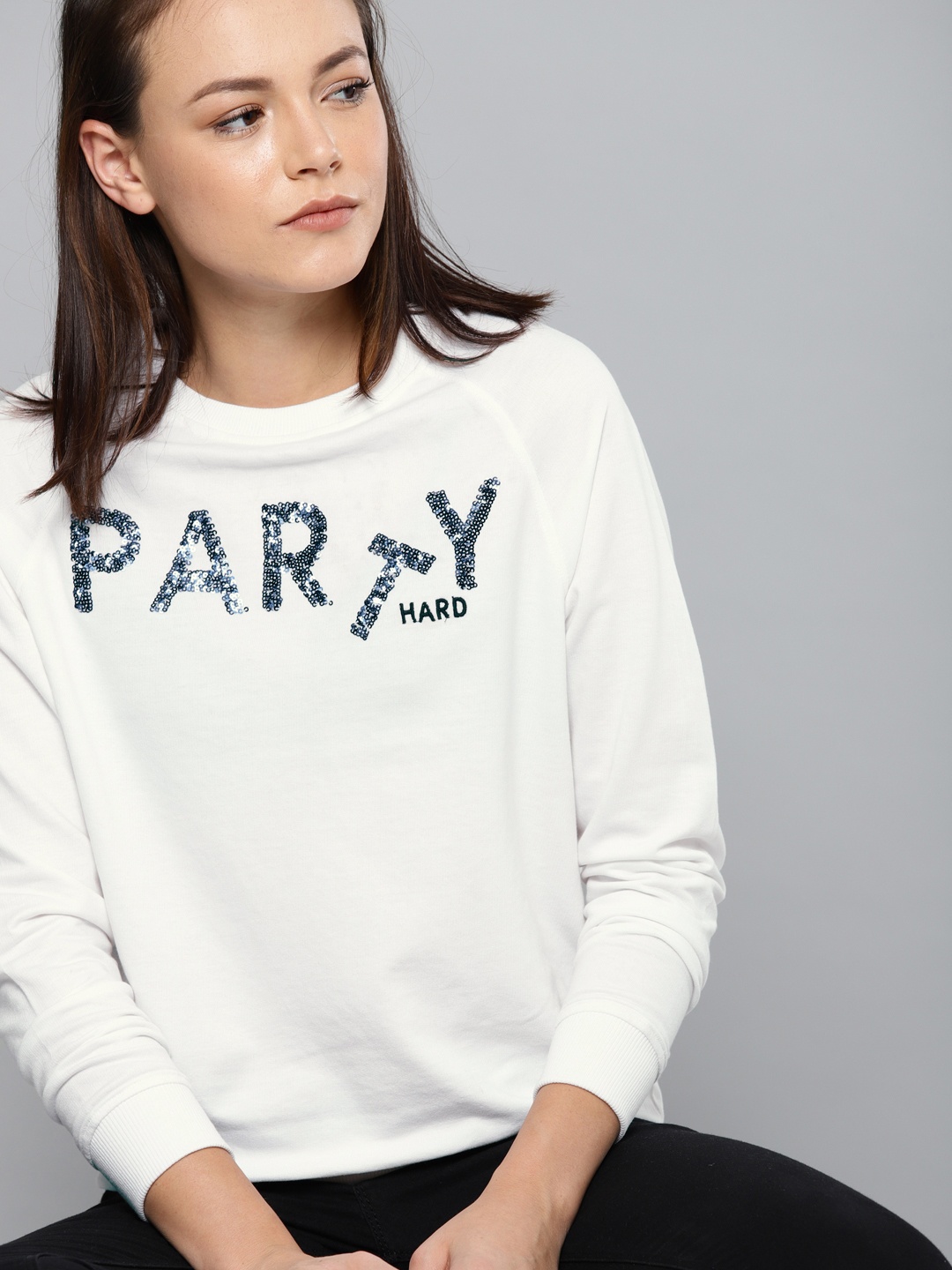 

Kook N Keech Women White Solid Sweatshirt