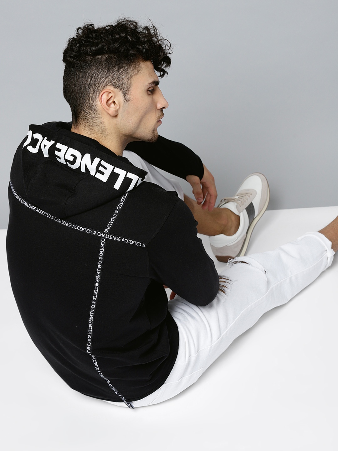 

Kook N Keech Men Black Solid Hooded Sweatshirt