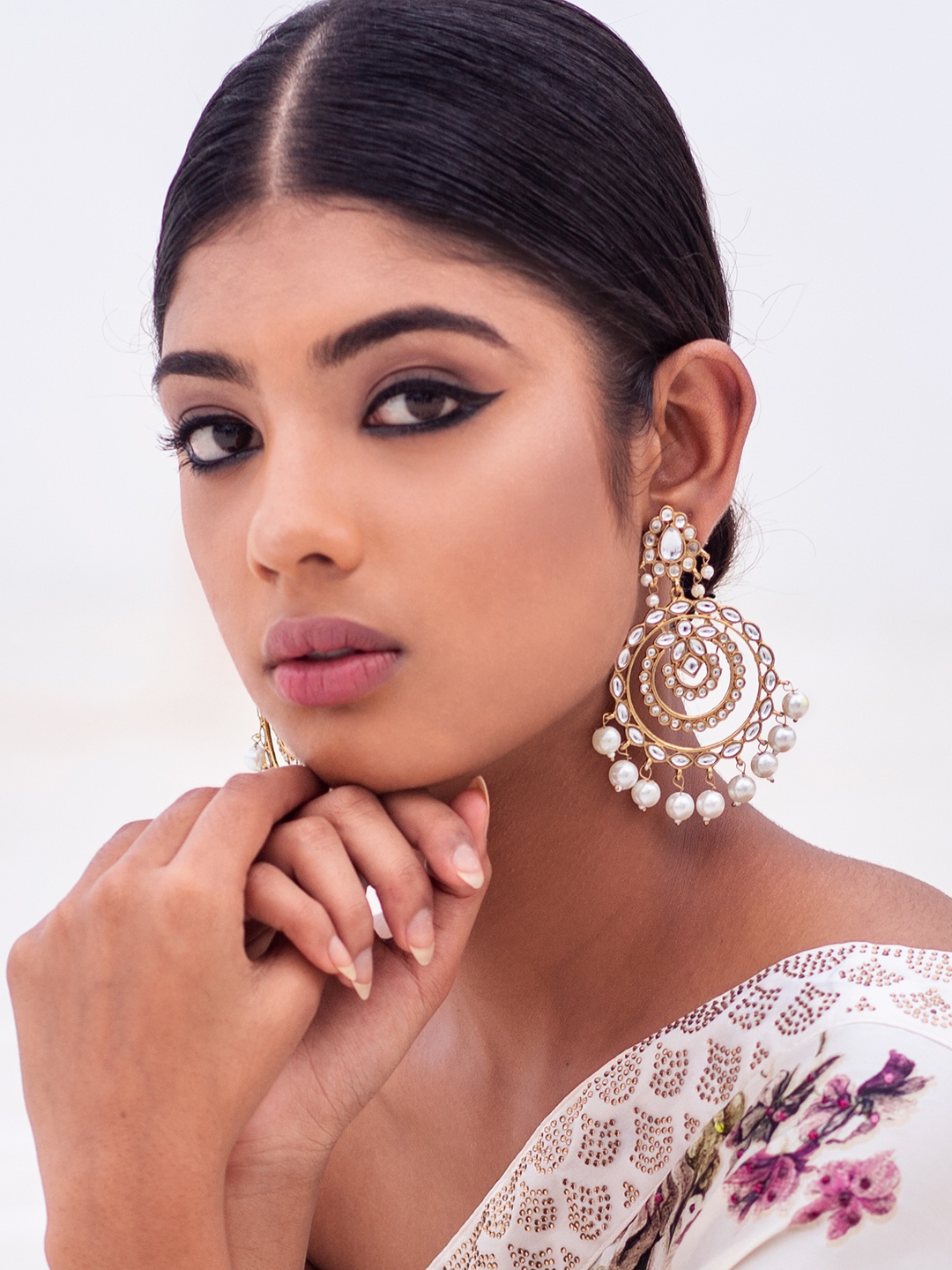 

Fida Gold-Toned & White Heavy Handcrafted Circular Drop Earrings