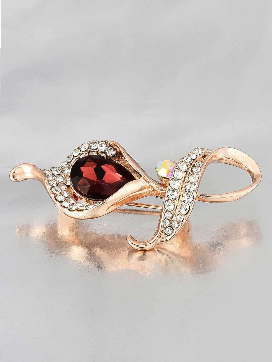 

Crunchy Fashion Women Gold-Toned & Brown Stone-Studded Leaf-Shaped Brooch
