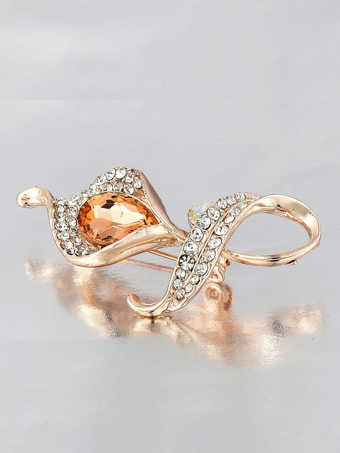 

Crunchy Fashion Women Gold-Toned & Peach-Coloured Stone-Studded Leaf-Shaped Brooch