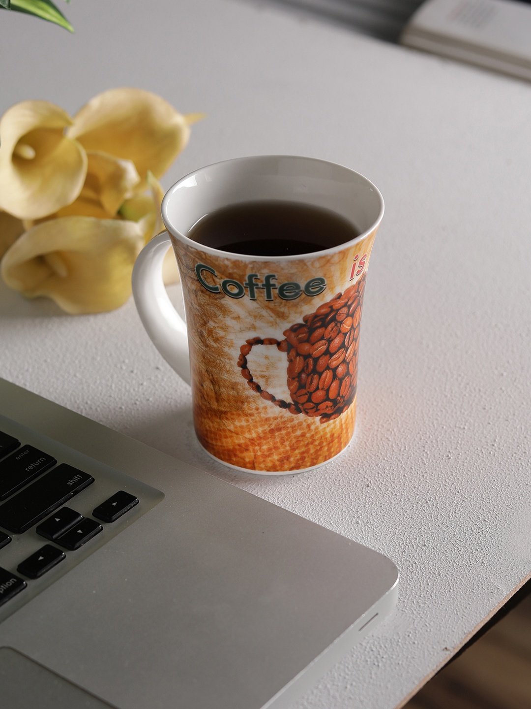 

CLAY CRAFT White & Brown 4-Pieces Printed Bone China Cups Set