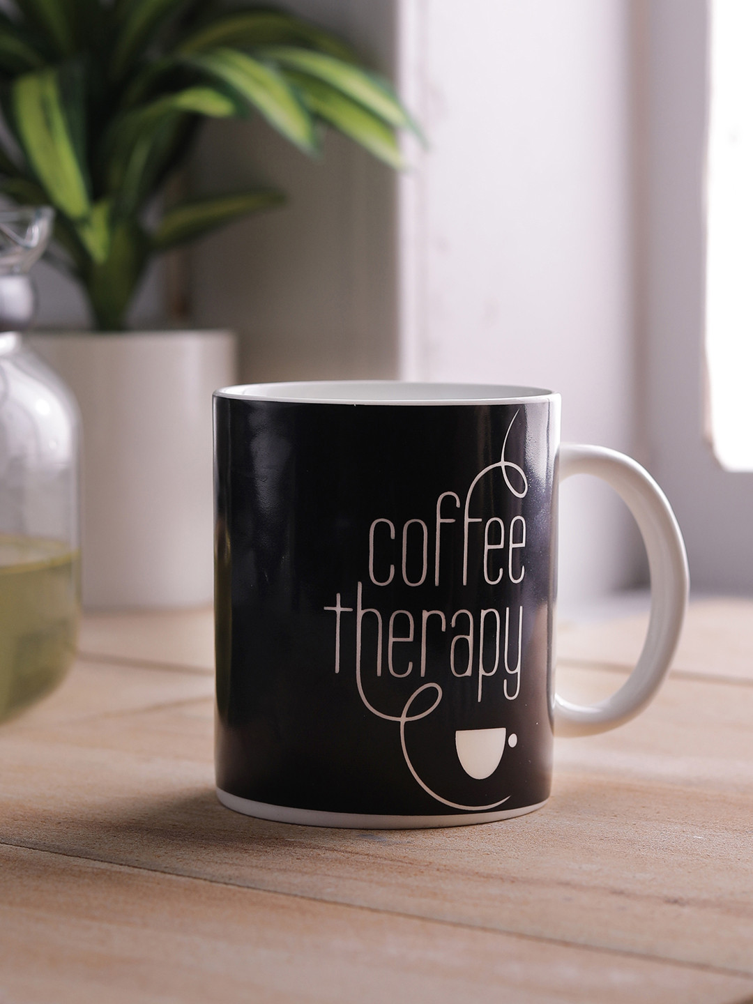 

CLAY CRAFT Black & White 4-Pieces Printed Bone China Cups Set