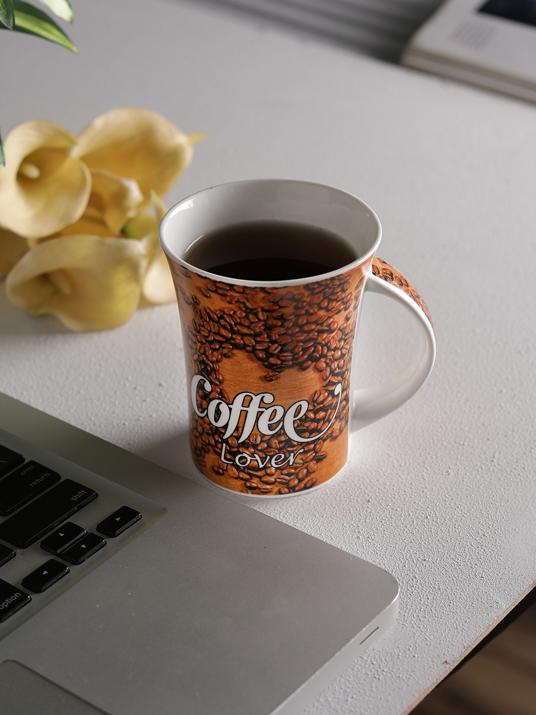 

CLAY CRAFT White & Brown 4-Pieces Printed Bone China Cups Set