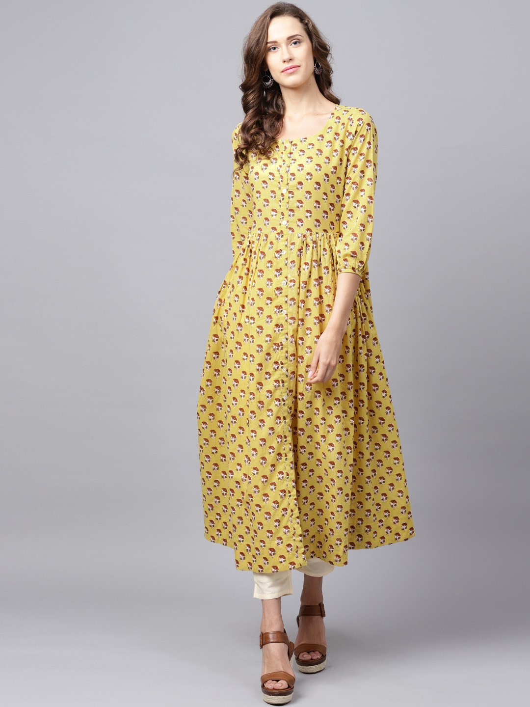 

Varanga Women Yellow Screen Print A-Line Kurta