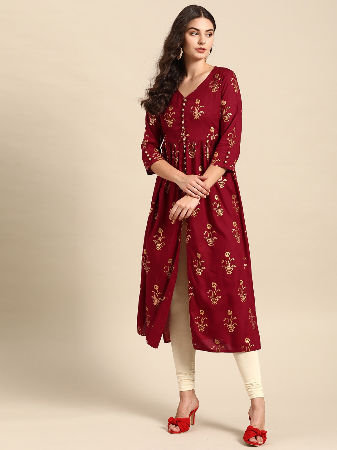 

Varanga Women Maroon & Golden Printed A-Line Kurta