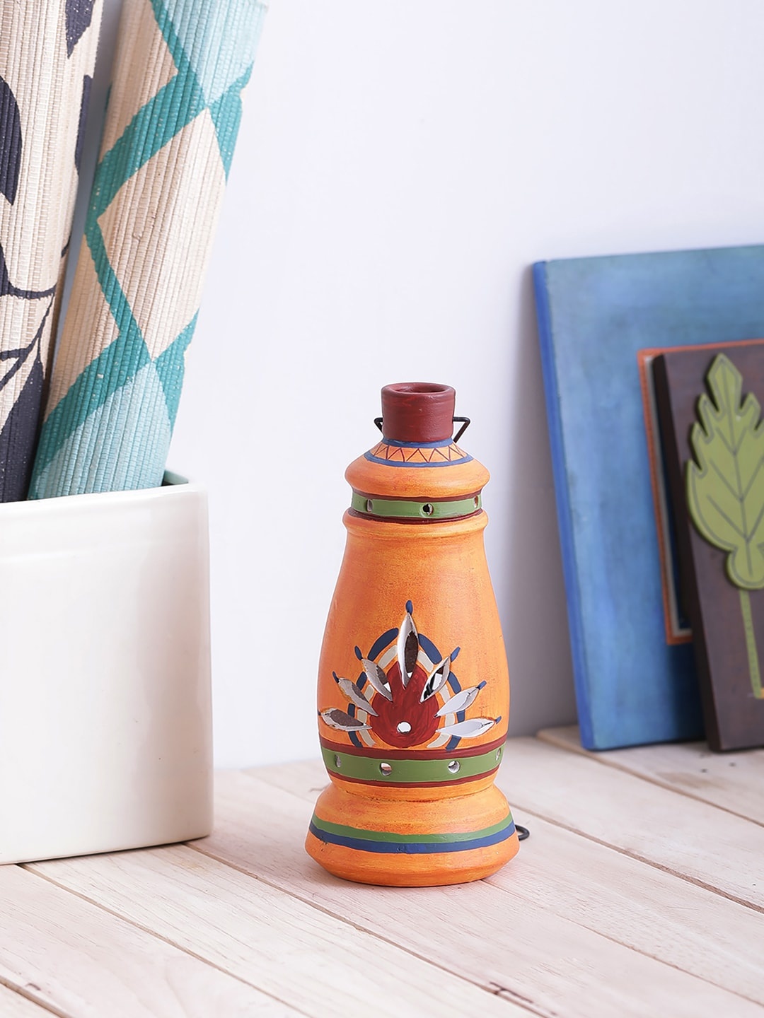 

VarEesha Orange Printed Terracotta Slim Tea Light Diya Hanging Lantern