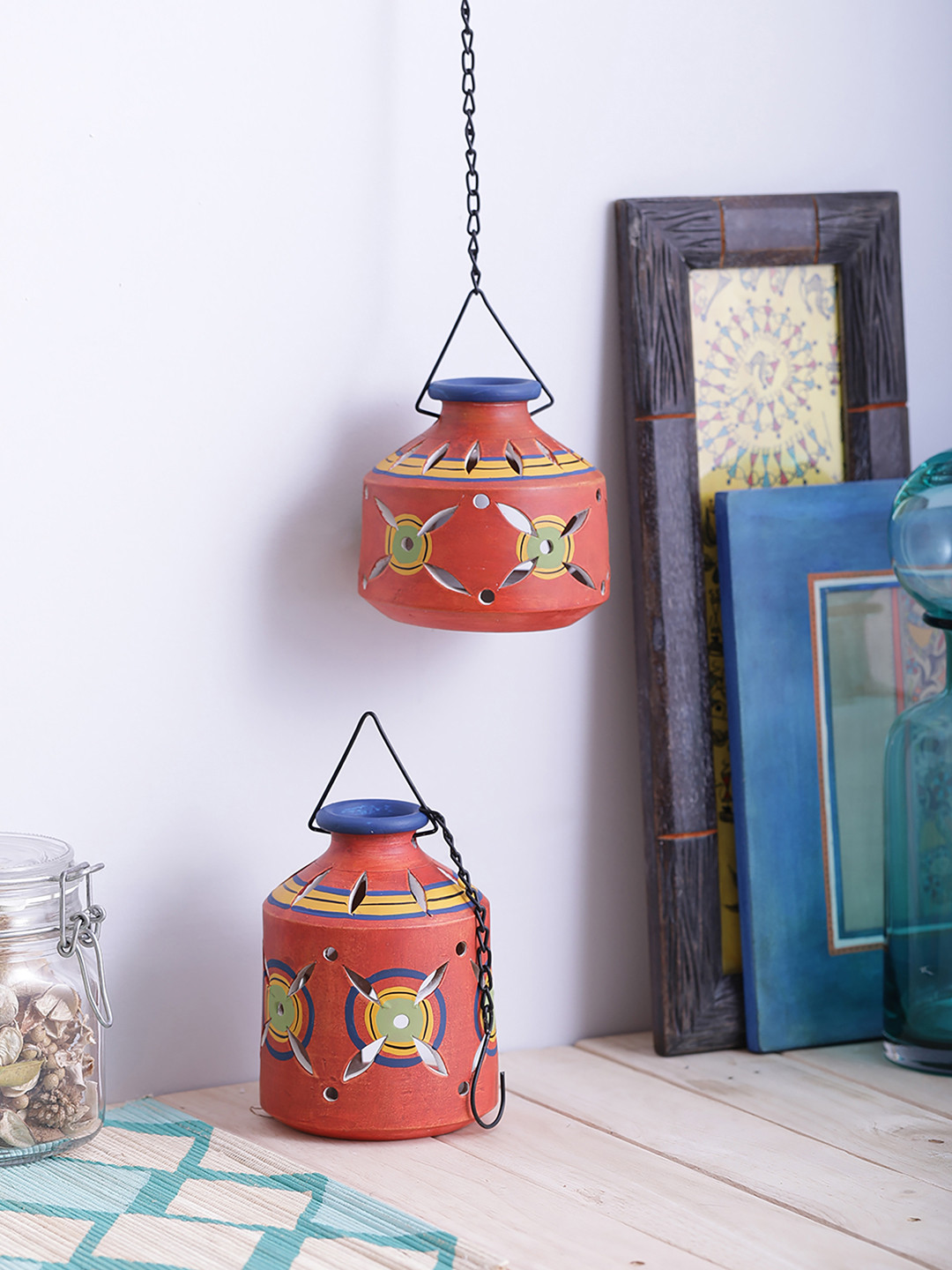 

VarEesha Red Printed Terracotta Tea Light Diya Hanging Lantern Set With Hanging Option