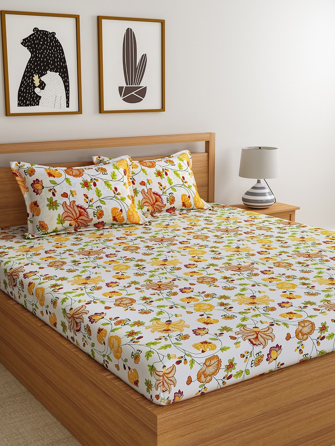 

Dreamscape Cream-Coloured Yellow Floral Flat 144 TC Cotton 1 Queen Bedsheet with 2 Pillow Covers