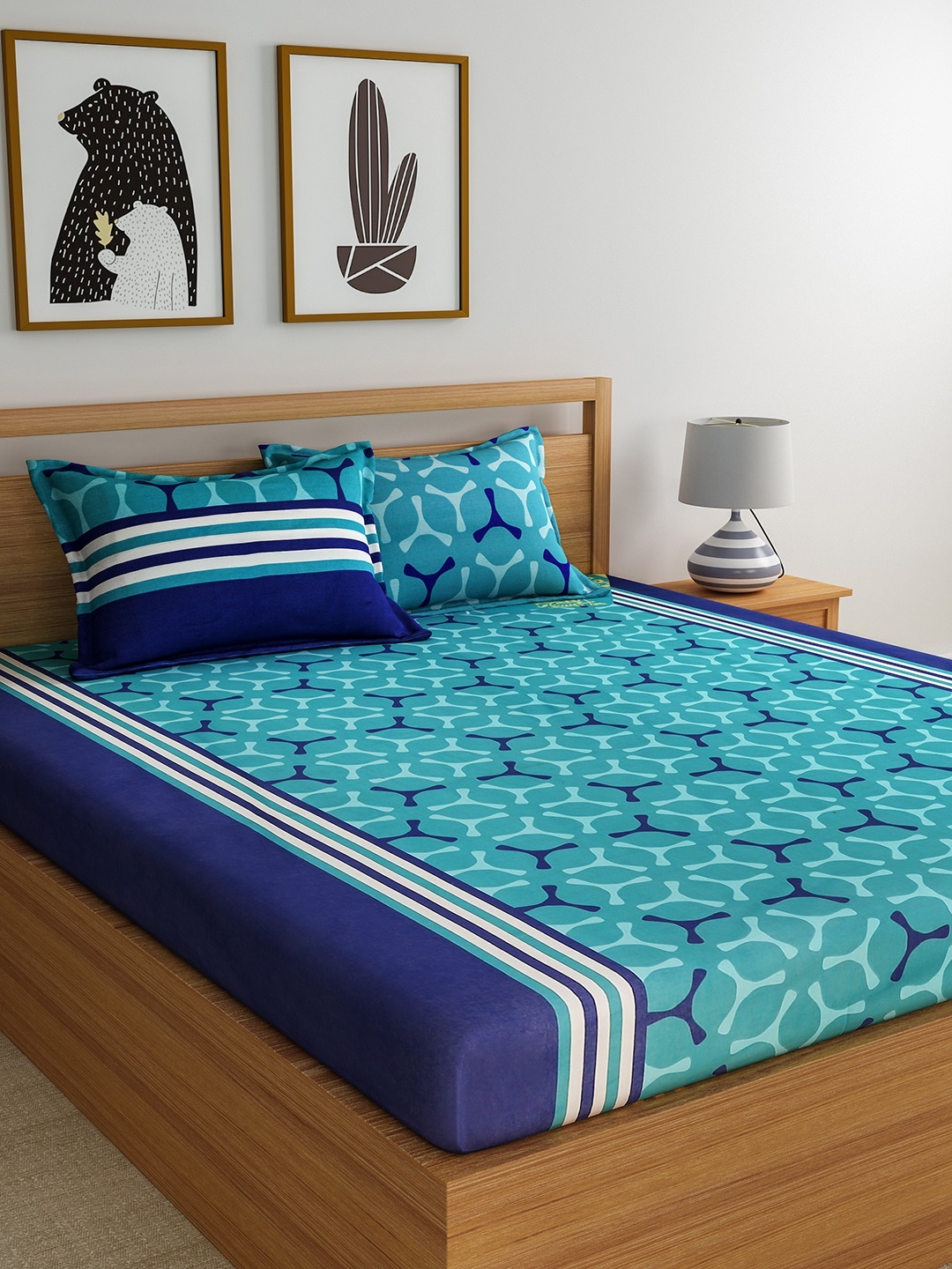 

Home Ecstasy Blue & Teal Geometric Flat 140 TC Cotton 1 Queen Bedsheet with 2 Pillow Covers