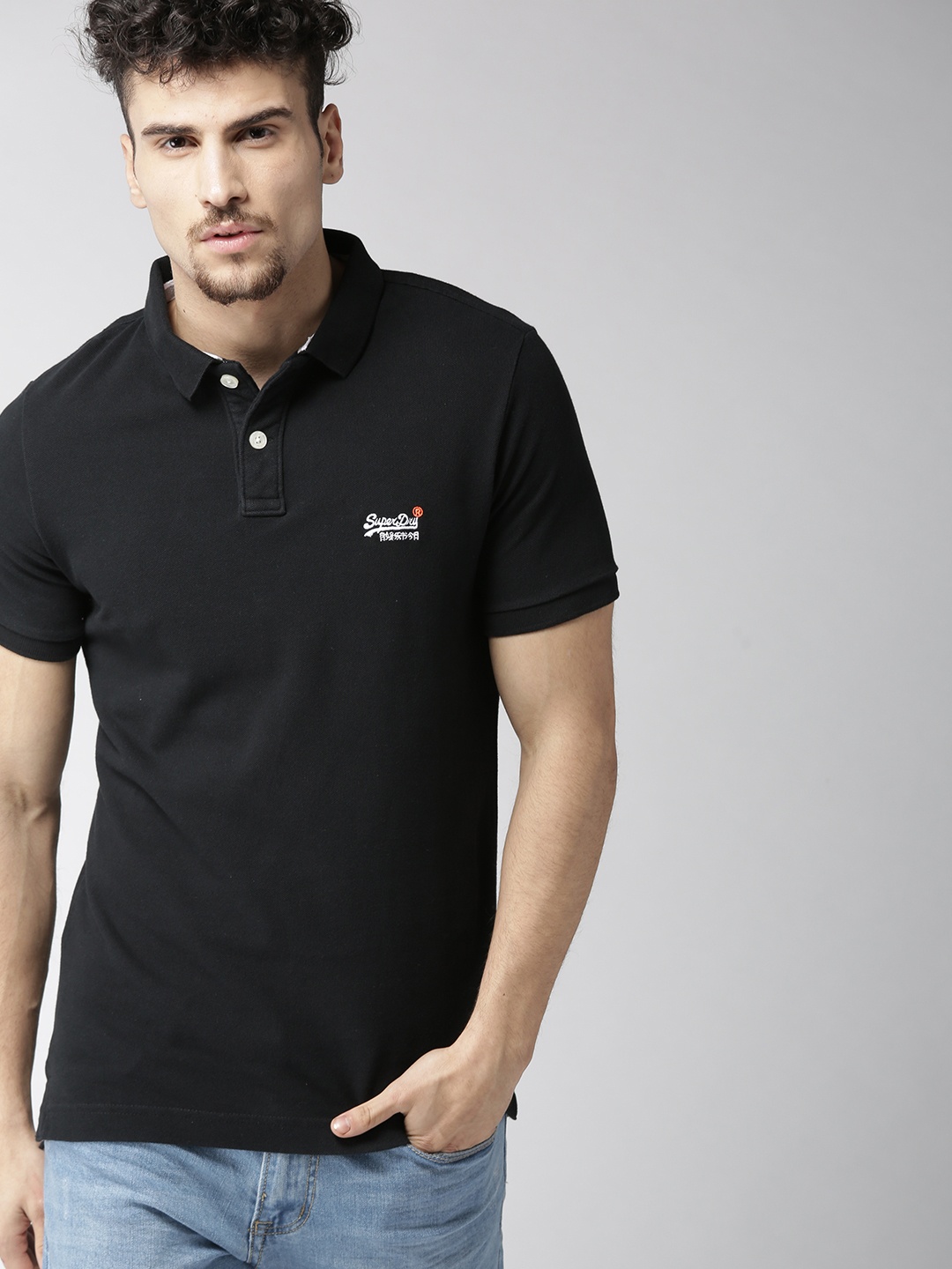 

Superdry Men Black Solid Polo Collar Pure Cotton T-shirt