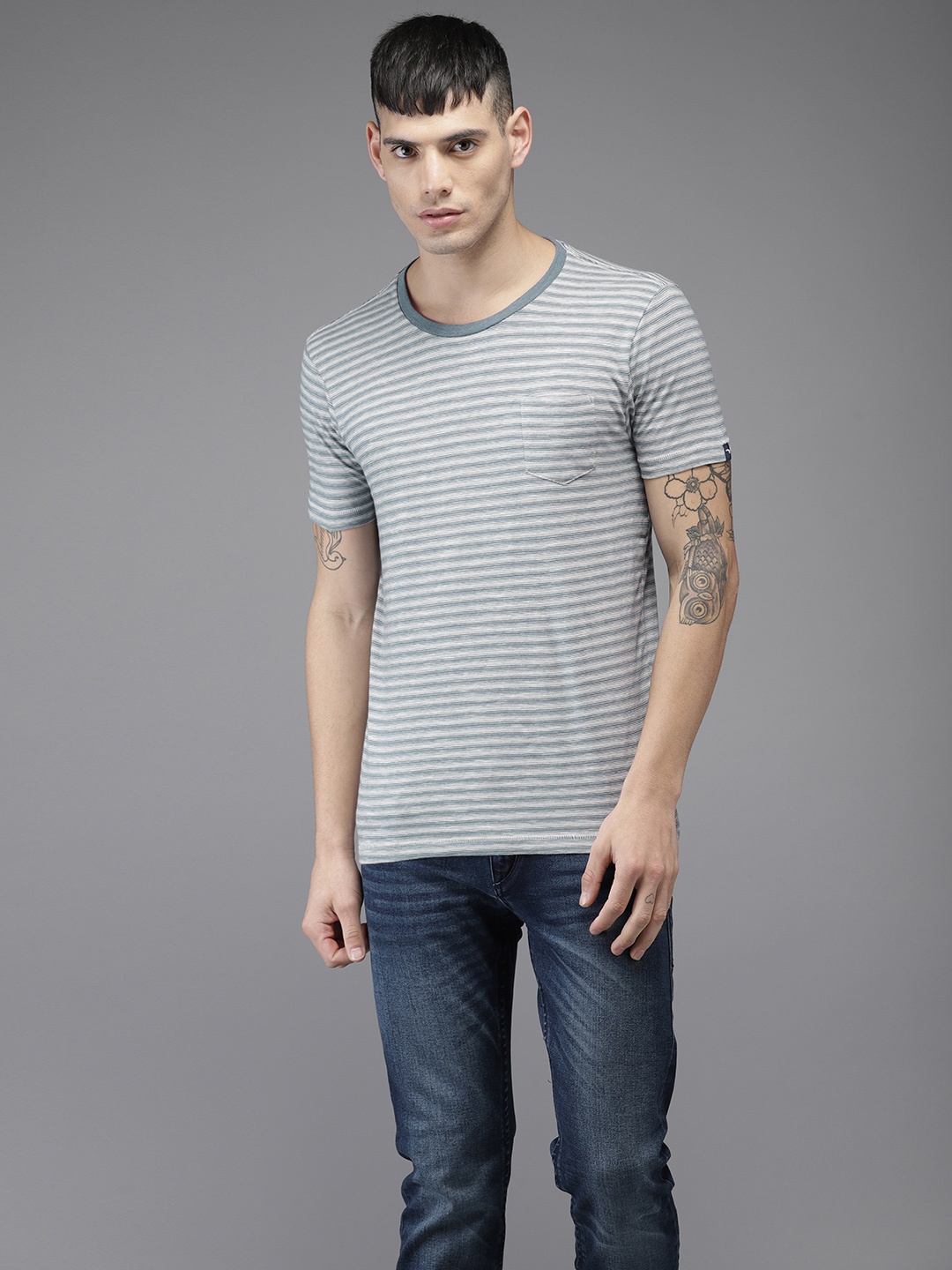 

Flying Machine Men Blue & Off-White Striped Round Neck T-shirt