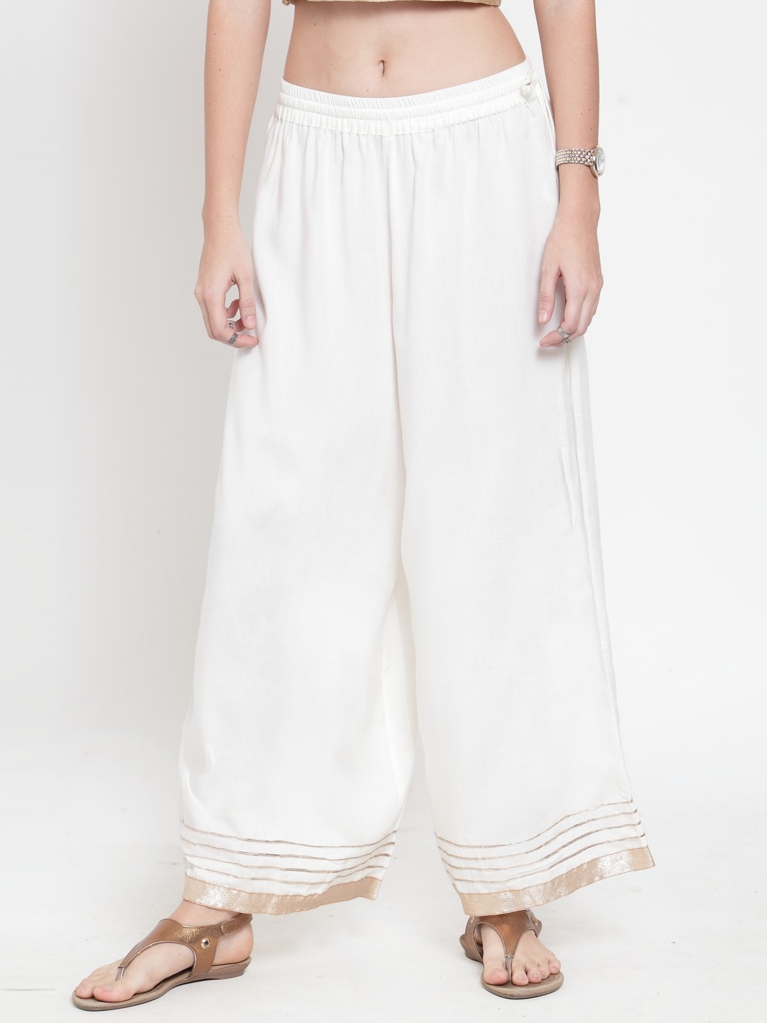 

Varanga Women Off-White Flared Solid Palazzos