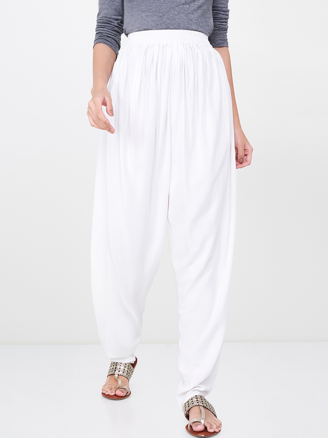 

Global Desi Women Off-White Regular Fit Solid Jodhpuris
