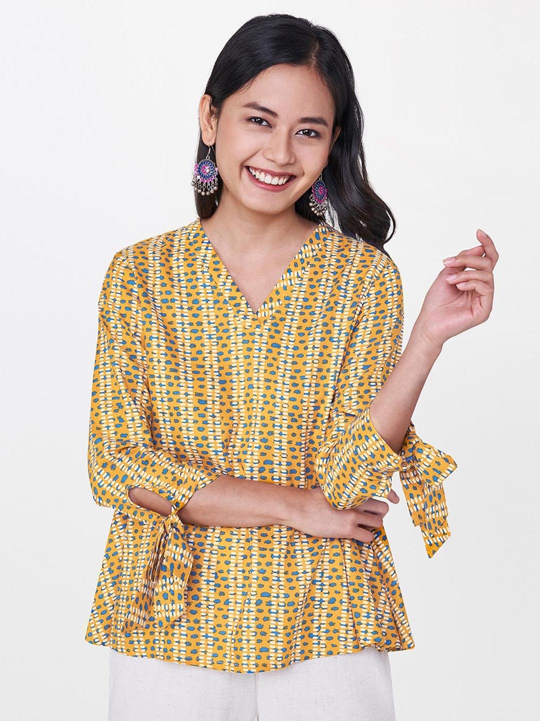 

Global Desi Women Yellow & Blue Printed Top