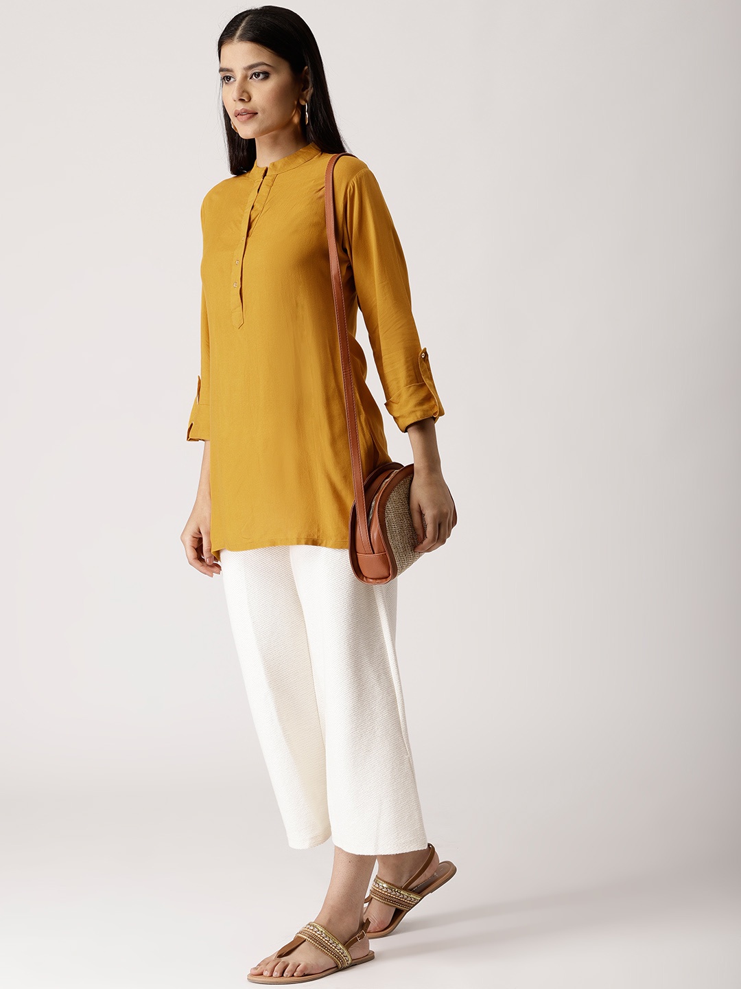 

Libas Mustard Yellow Solid Kurti