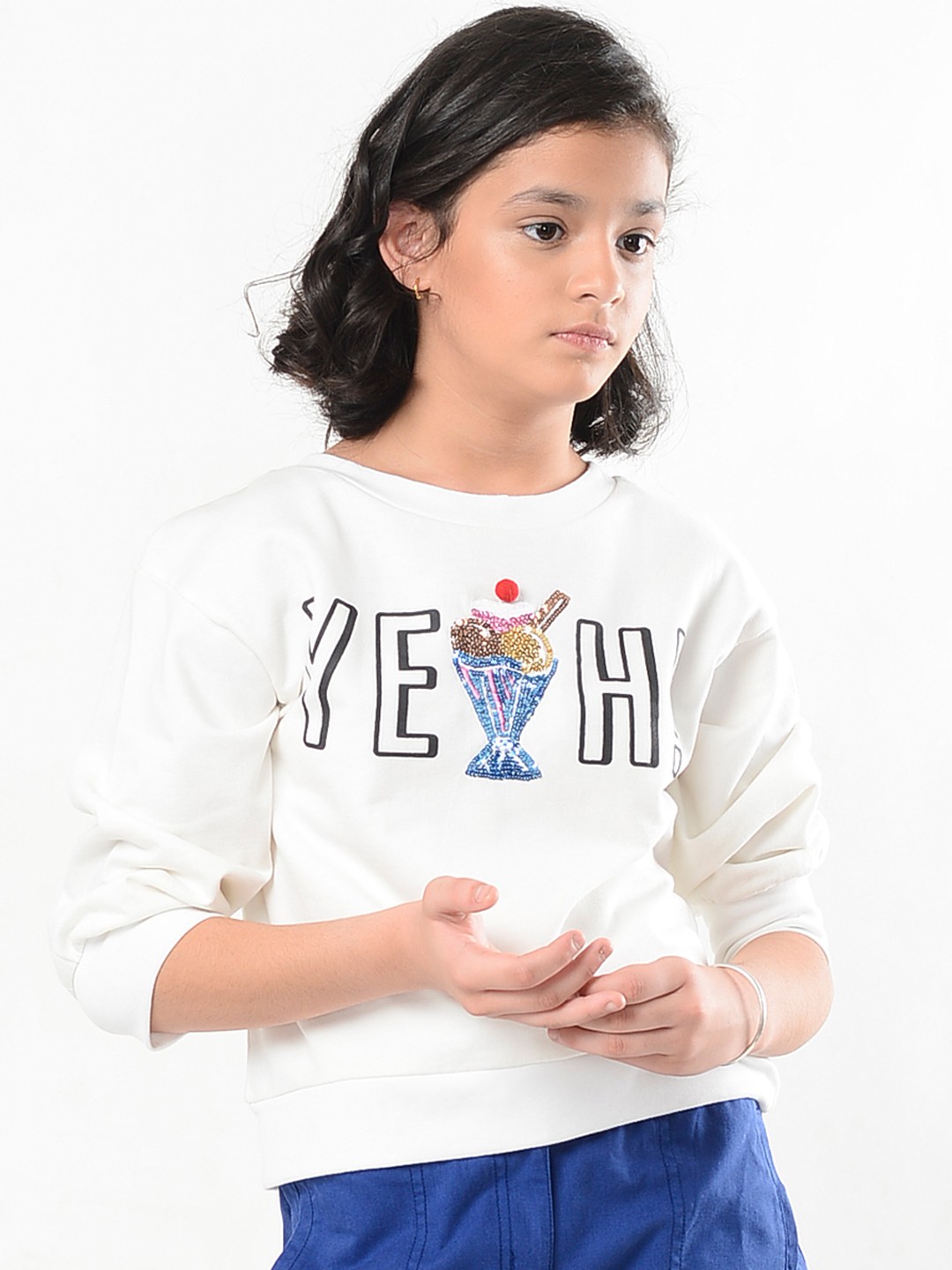 

Natilene Girls Off-White & Black Printed Sweatshirt