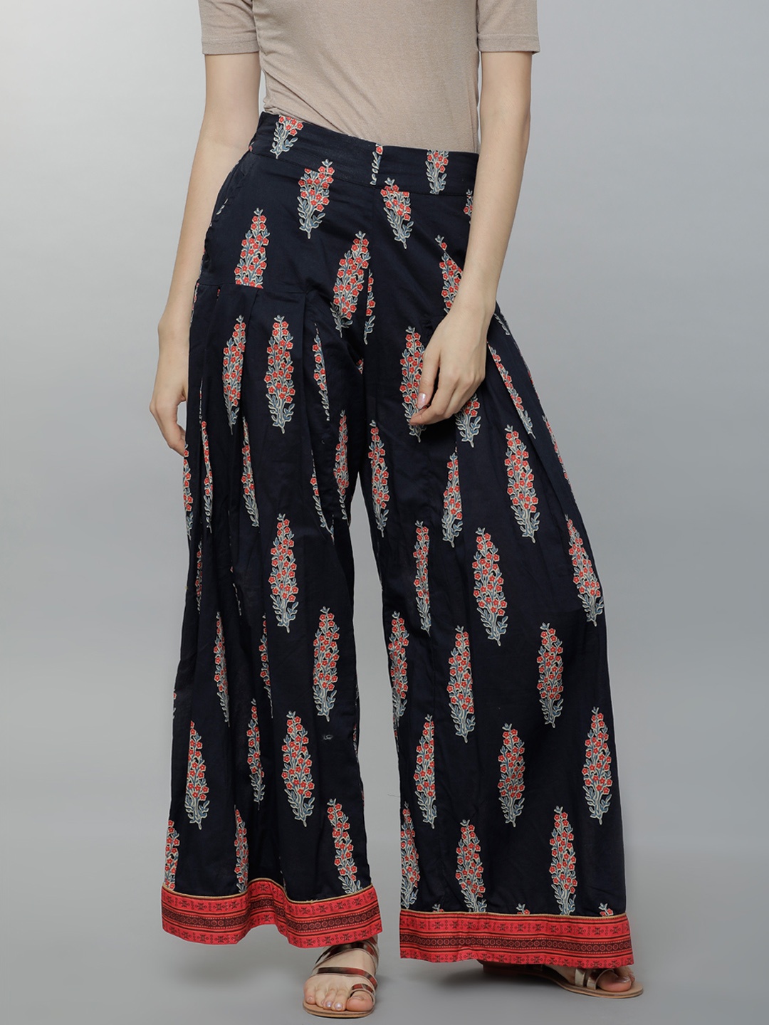 

Vishudh Women Black & Orange Printed Straight Palazzos