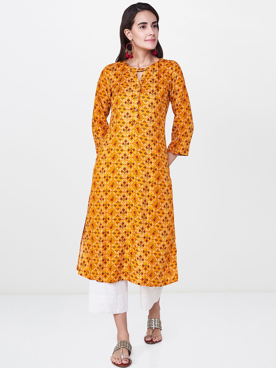 

Global Desi Women Mustard Printed Straight Kurta