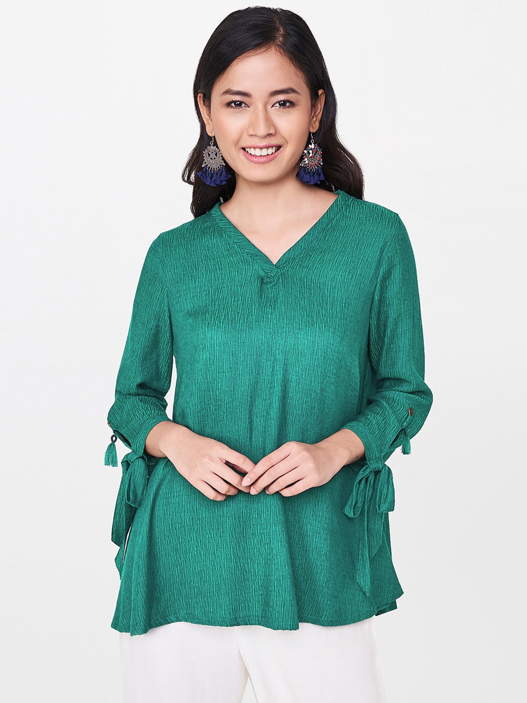 

Global Desi Women Green Self Design Top