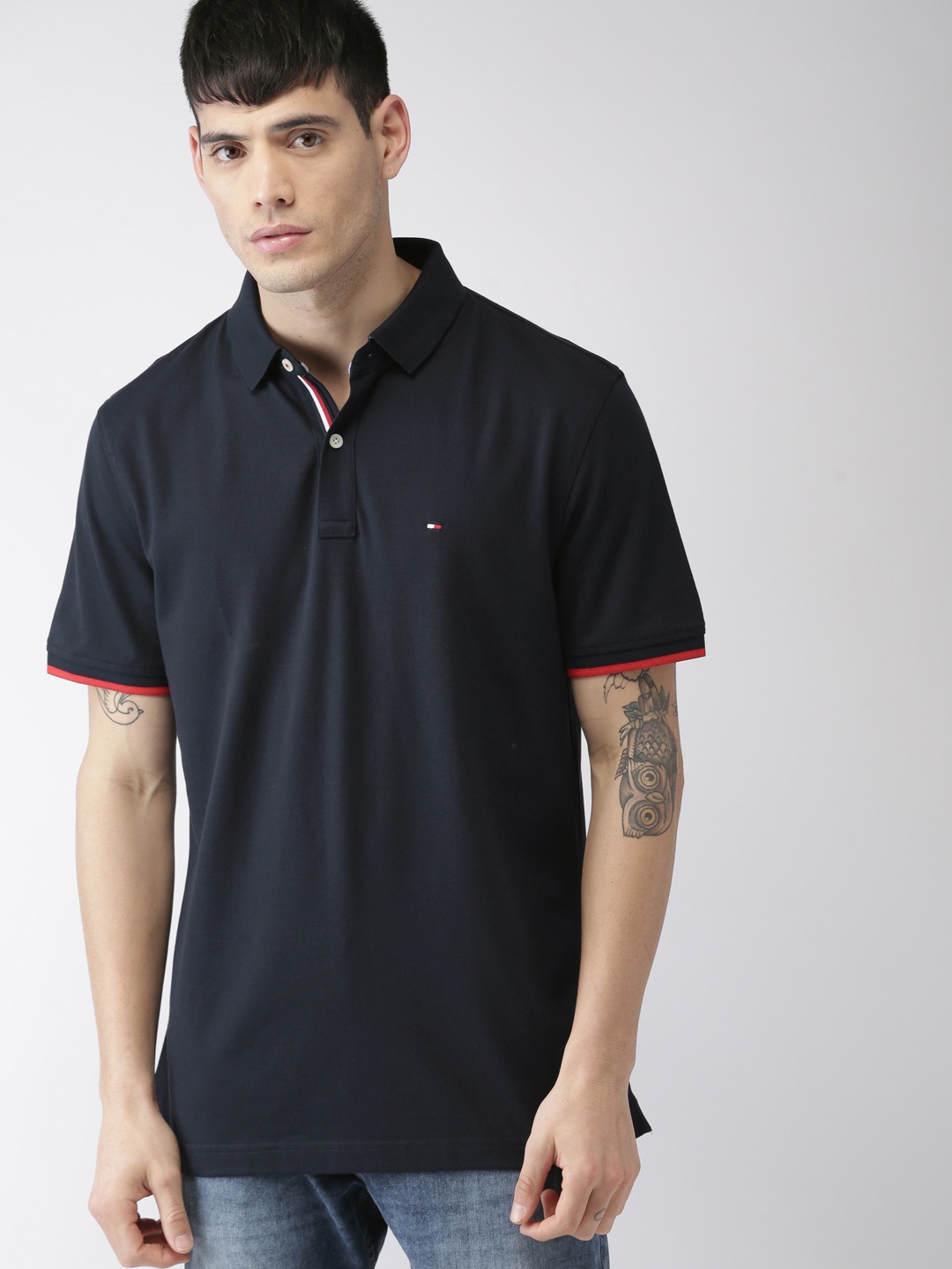 

Tommy Hilfiger Men Navy Blue Solid Polo Collar T-shirt