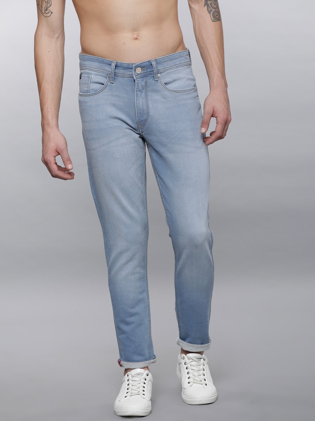 

LOCOMOTIVE Men Blue Tapered Fit Mid-Rise Clean Look Stretchable Jeans