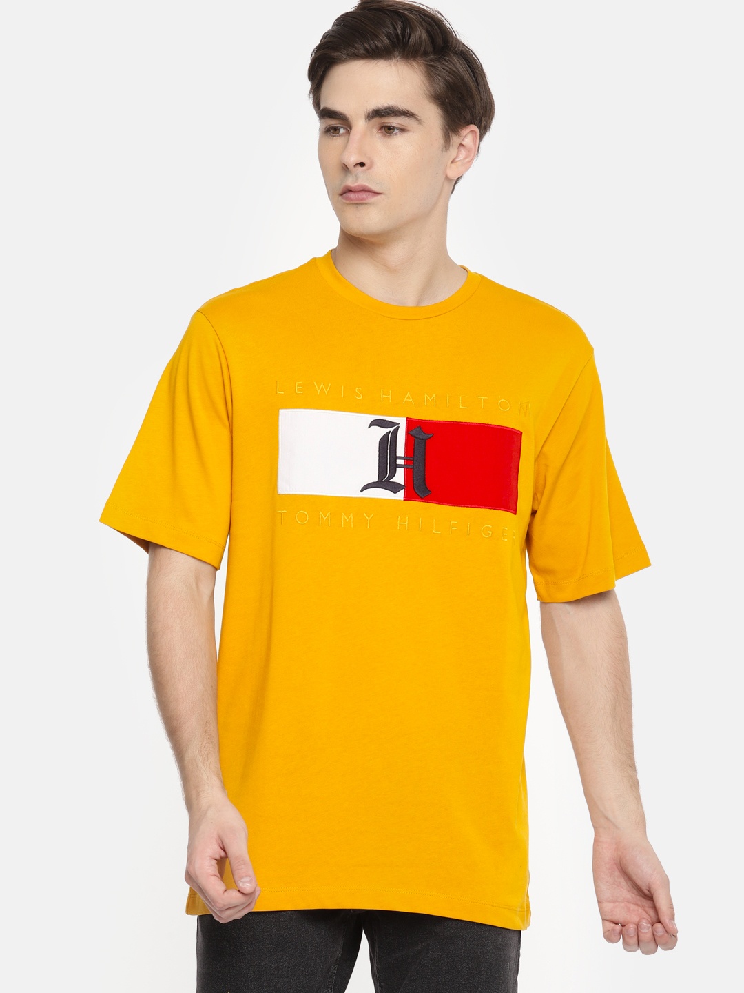 

Tommy Hilfiger Men Mustard Yellow Printed Round Neck Pure Cotton T-shirt