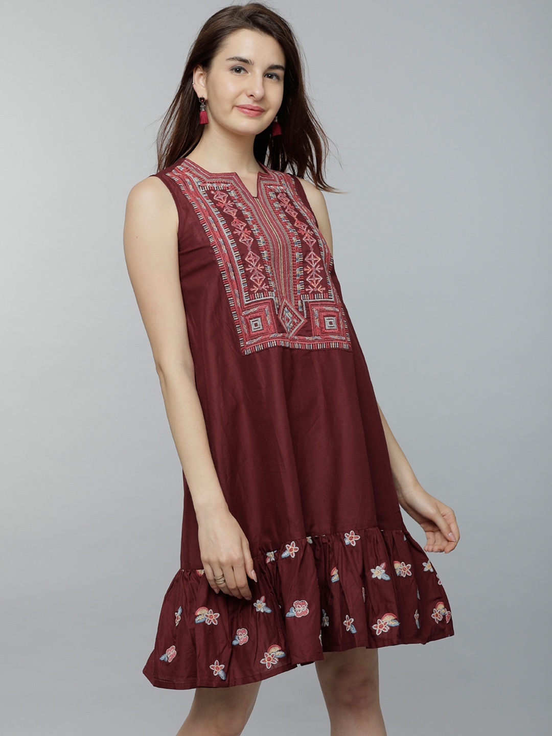 

Tokyo Talkies Women Maroon Self Design Peplum Dress