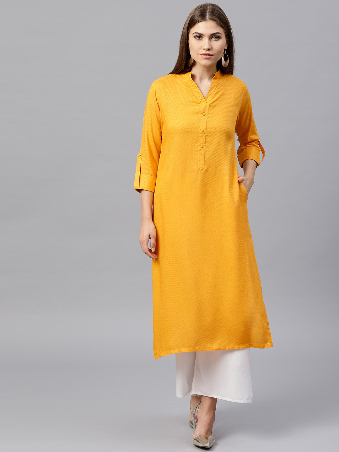 

Gerua By Libas Women Yellow Solid Straight Kurta