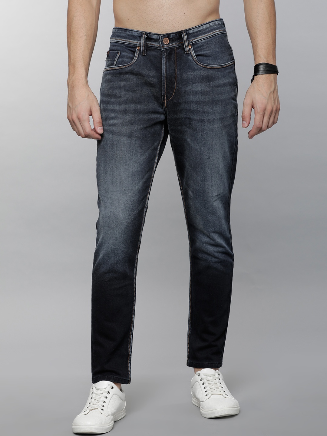 

LOCOMOTIVE Men Blue Tapered Fit Mid-Rise Clean Look Stretchable Jeans