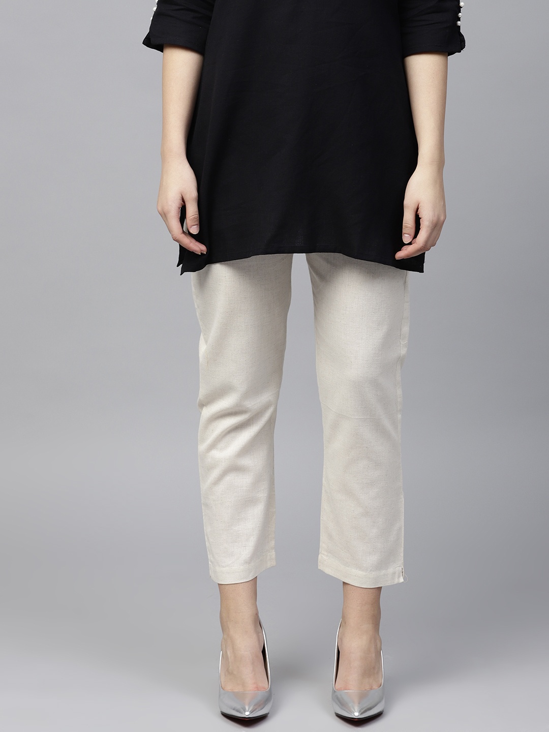 

PINKSKY Women Off-White Slim Fit Solid Cropped Regular Trousers