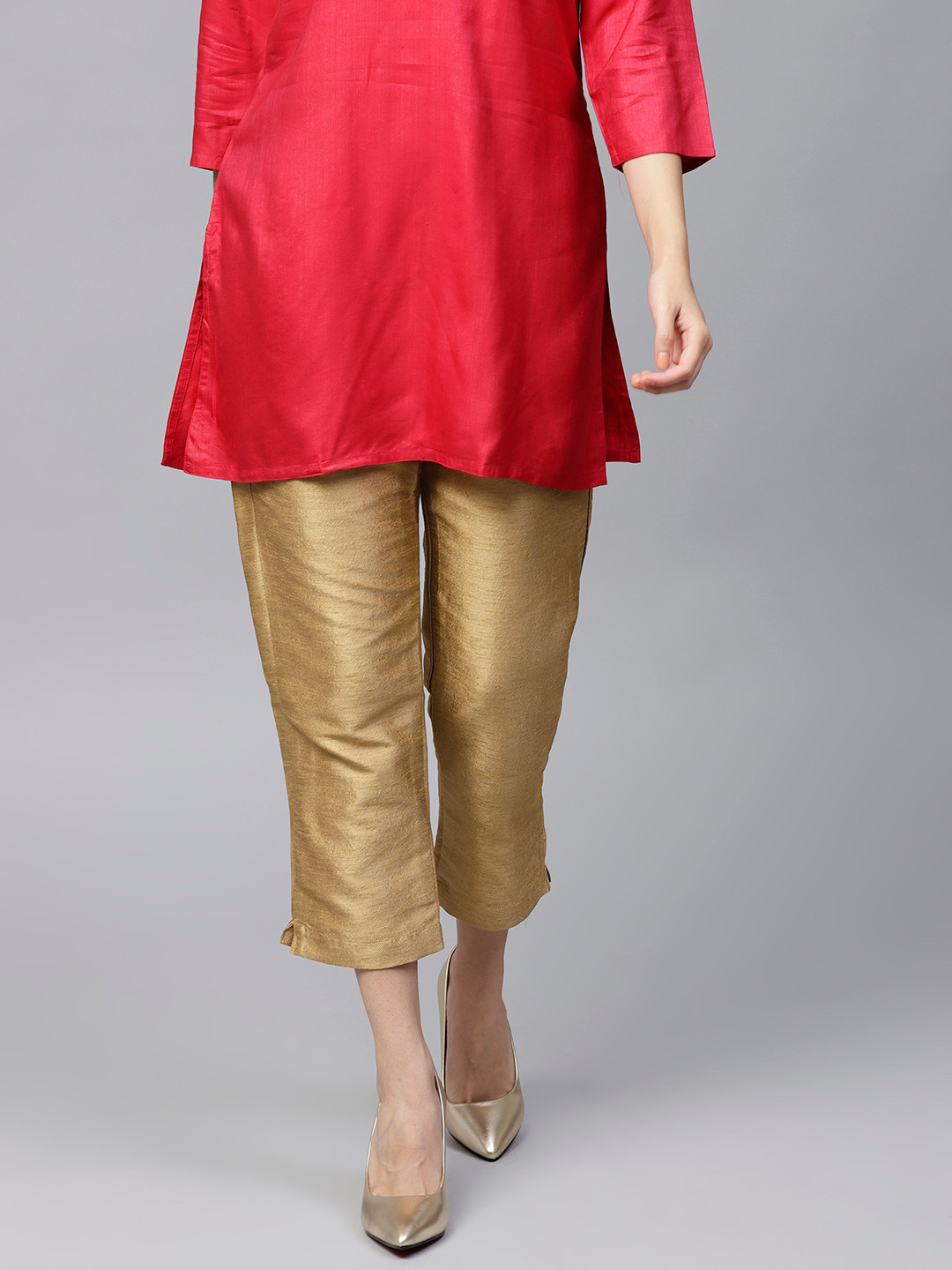 

PINKSKY Women Golden Slim Fit Solid Cropped Regular Trousers, Gold