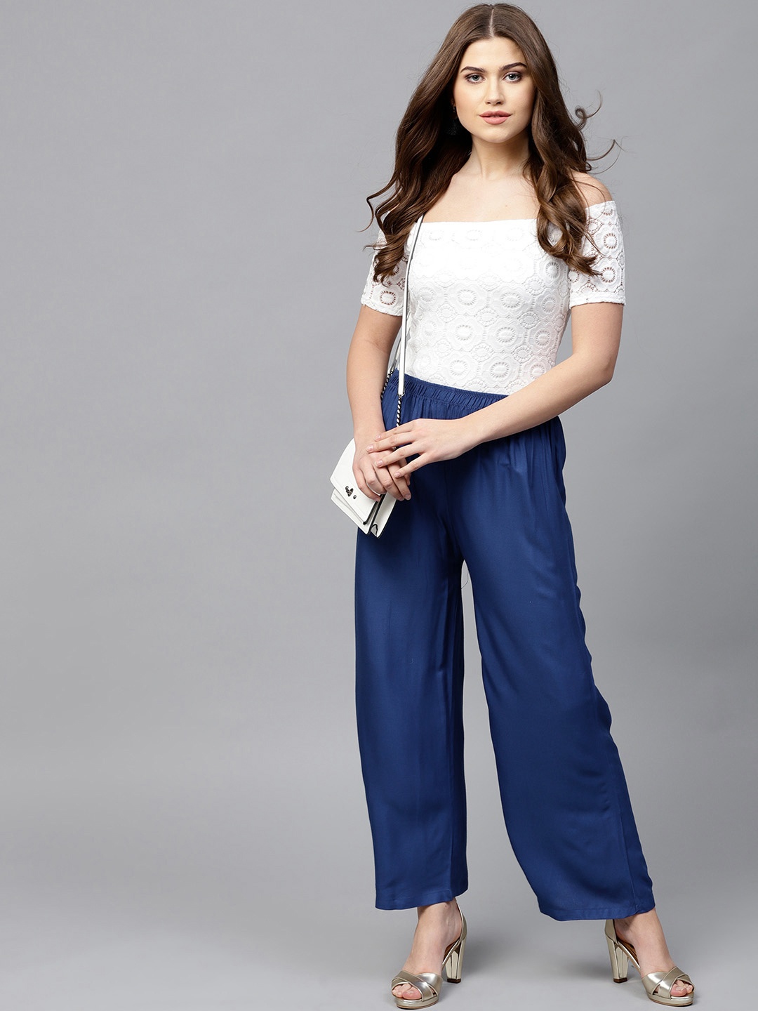 

PINKSKY Women Blue Solid Straight Palazzos