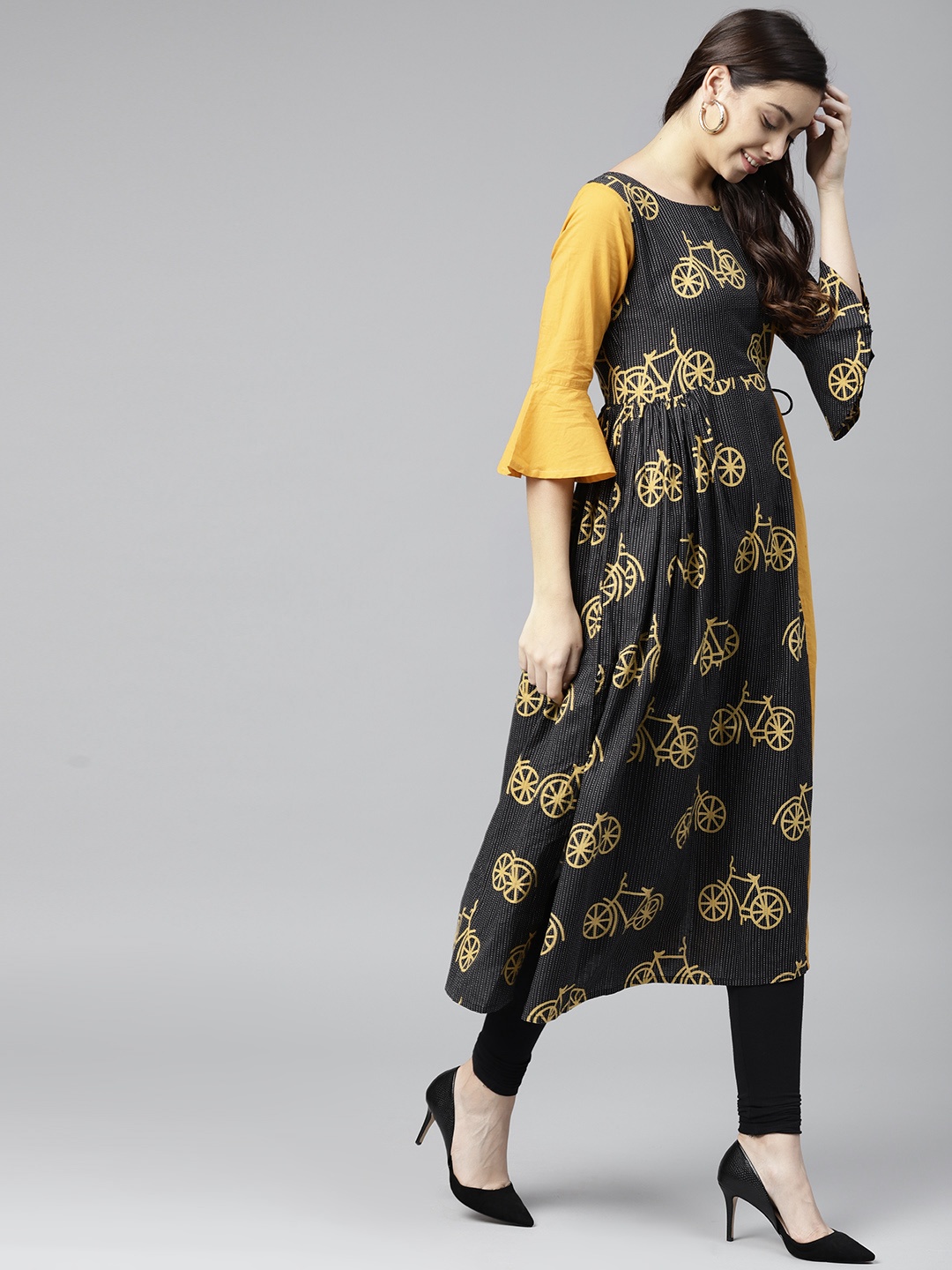 

Varanga Women Black & Mustard Yellow Quirky Printed A-Line Kurta
