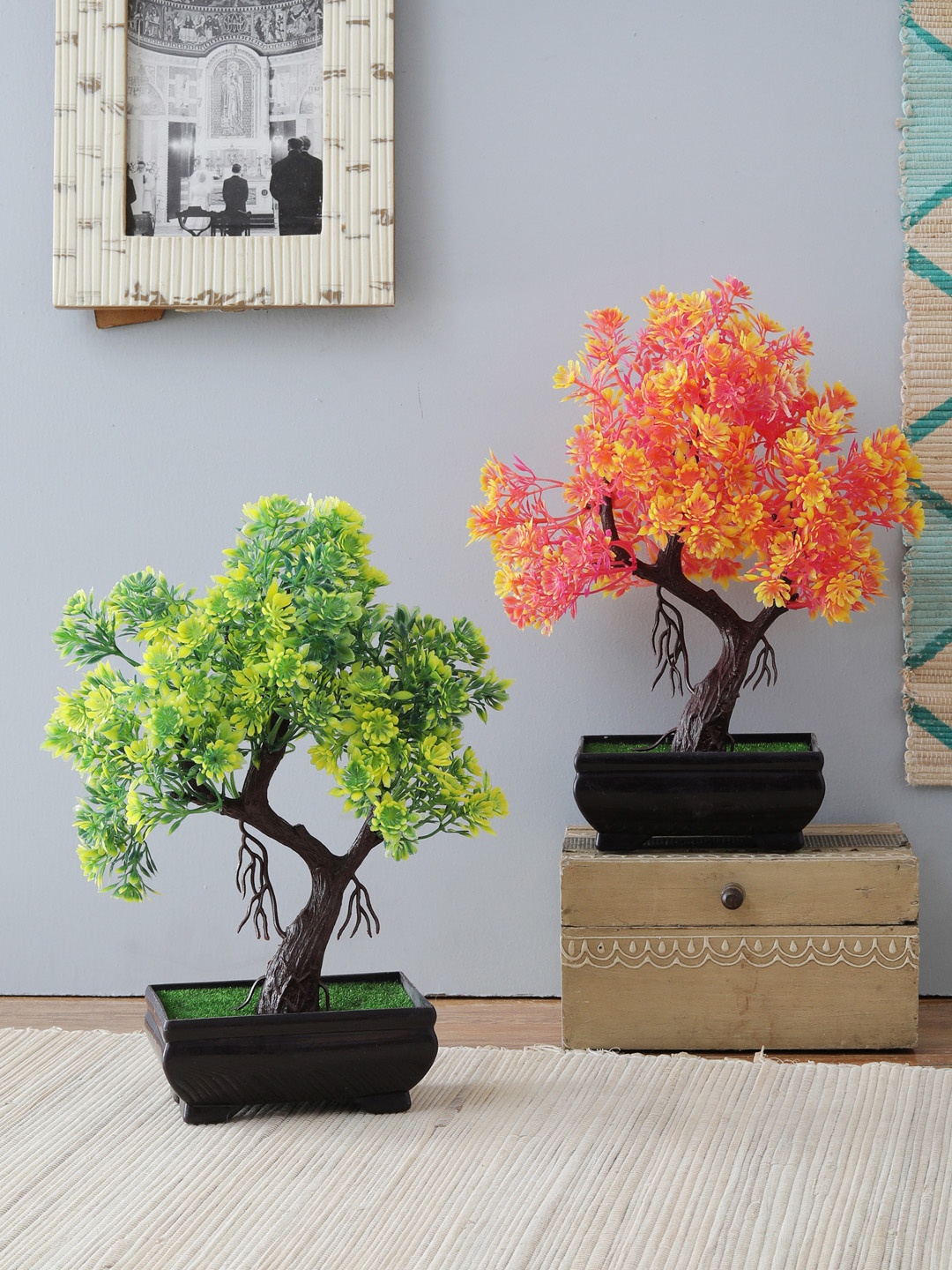 

Foliyaj S Shaped Bonsai Tree With Green Leaves and Small Purple Flowers in Brown Pot, Orange