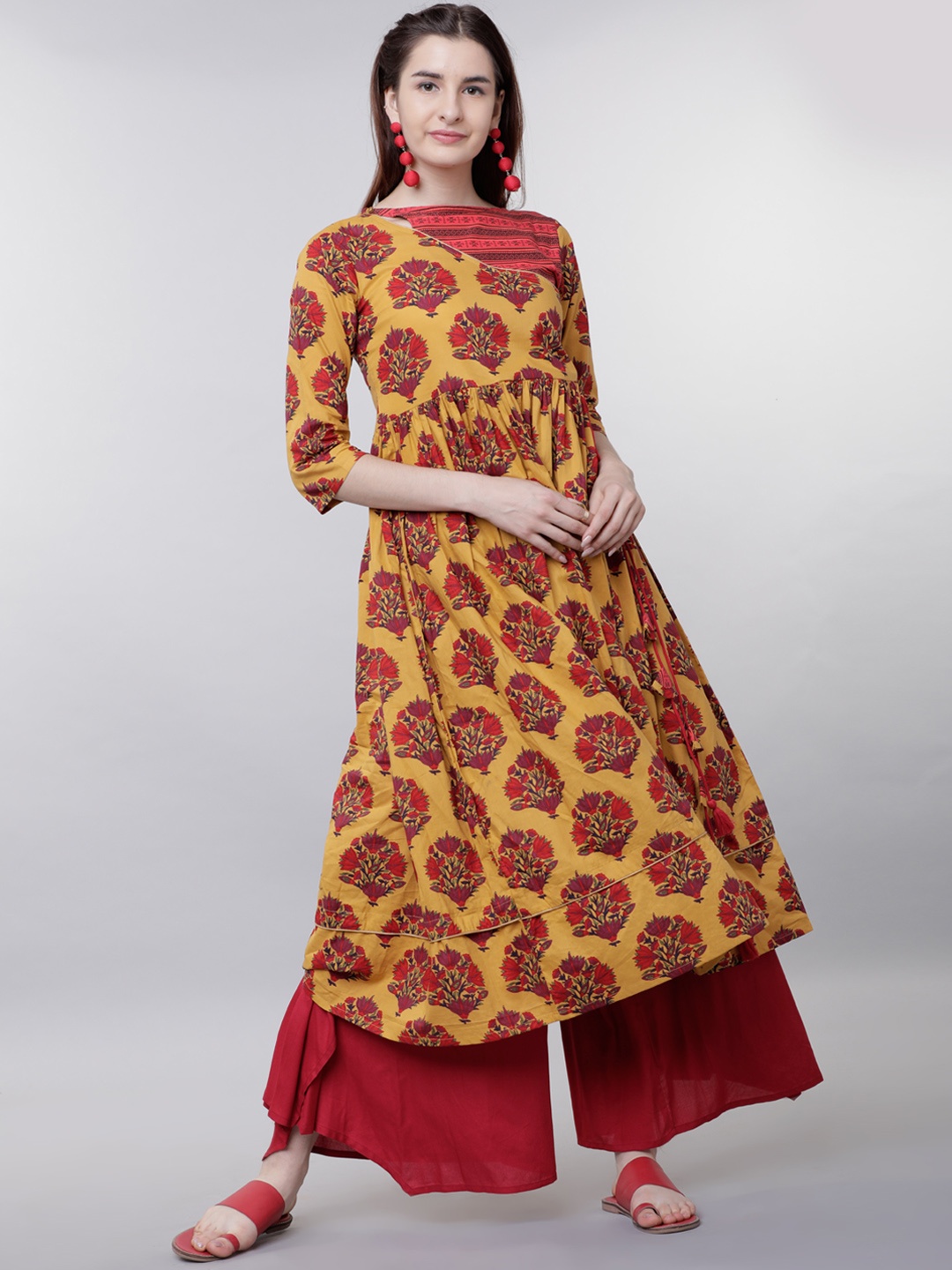 

Vishudh Women Mustard & Red Printed Anarkali Kurta