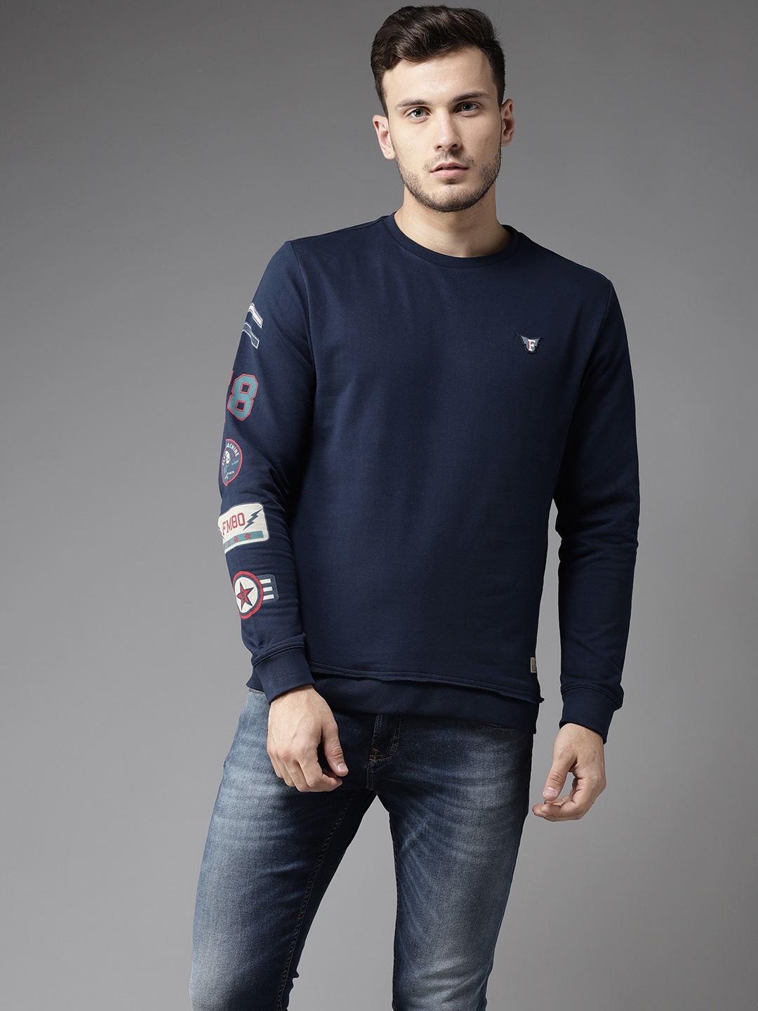 

Flying Machine Men Navy Blue Solid Sweatshirt